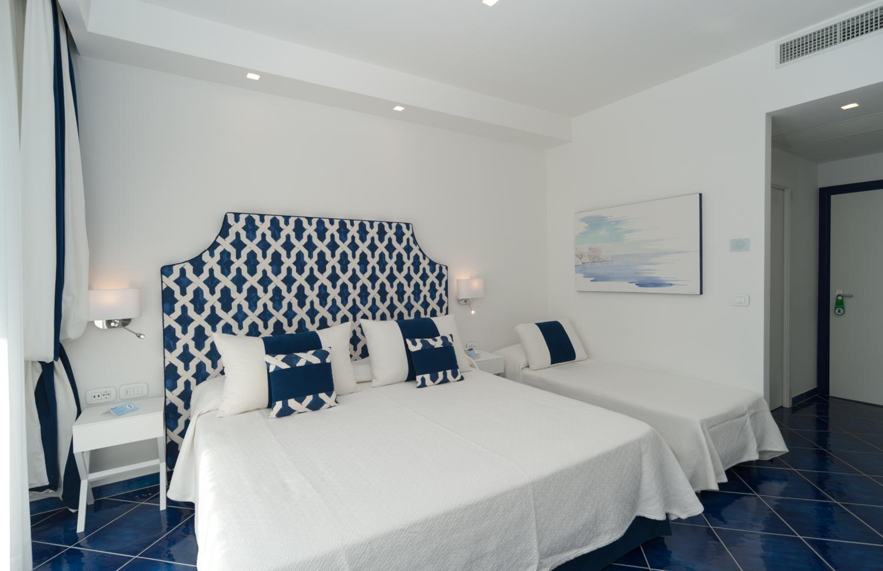 Deluxe Triple Room with Balcony & Sea View