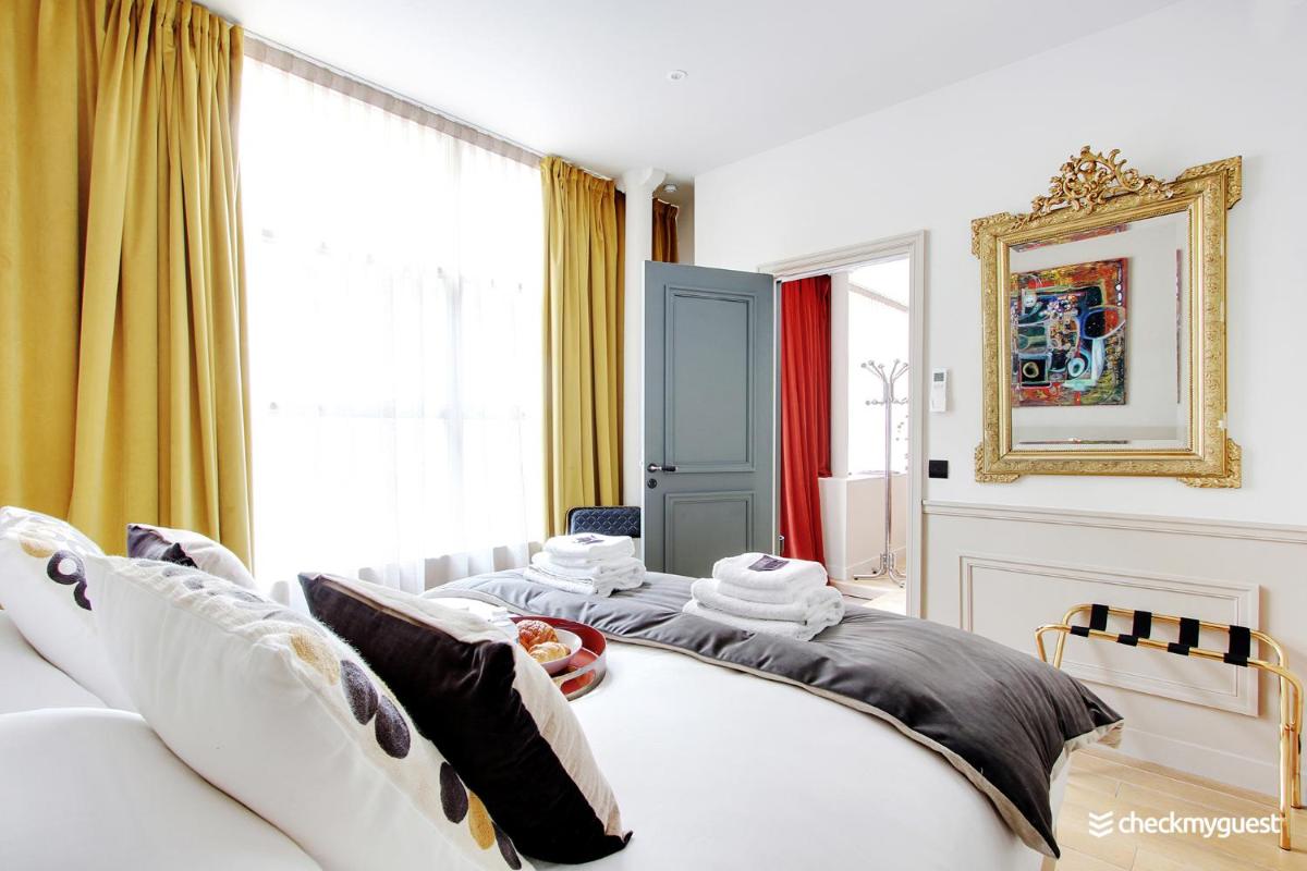 Three-Bedroom Apartment photo 1