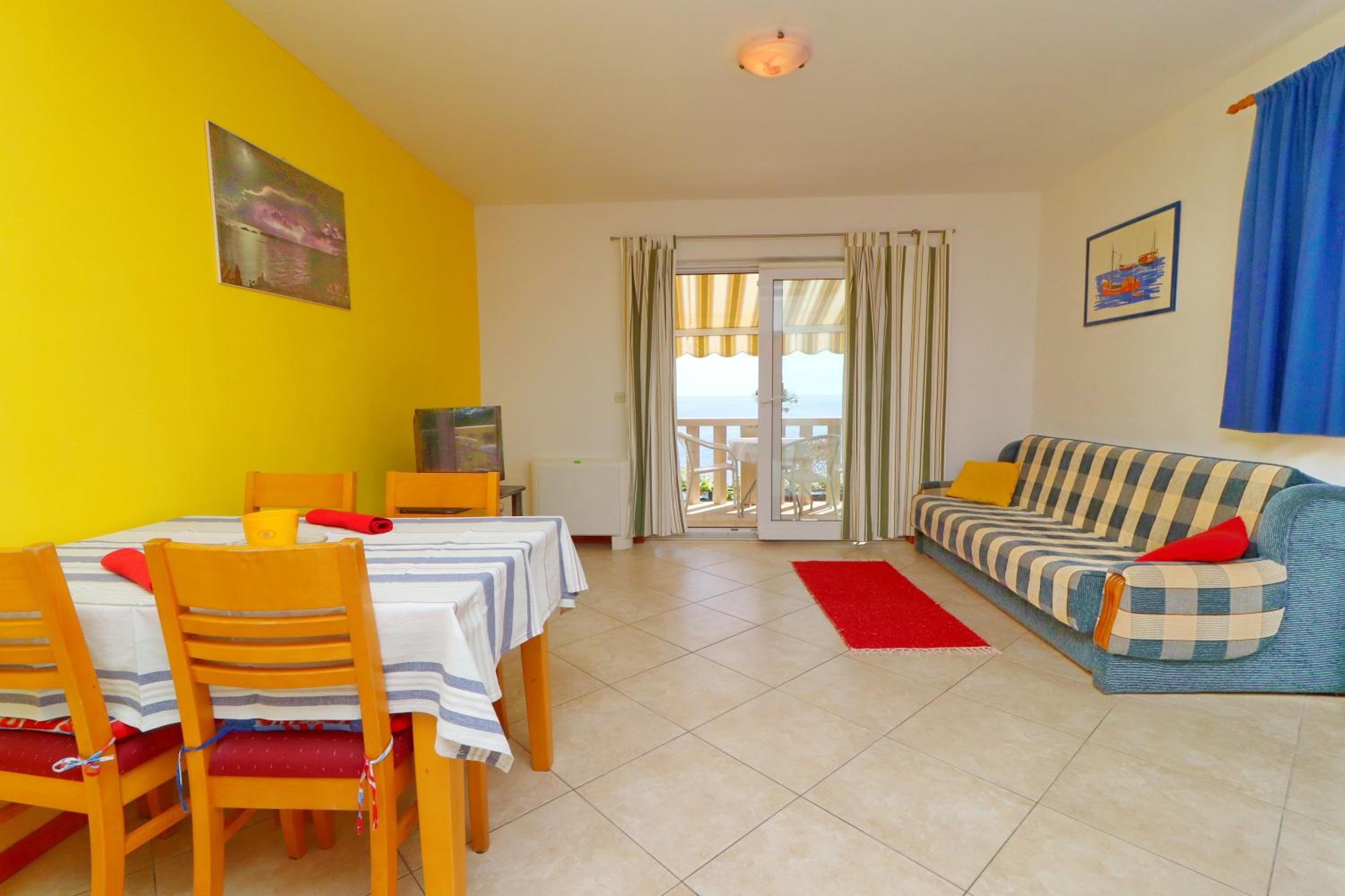 One-Bedroom Apartment with Balcony and Sea View