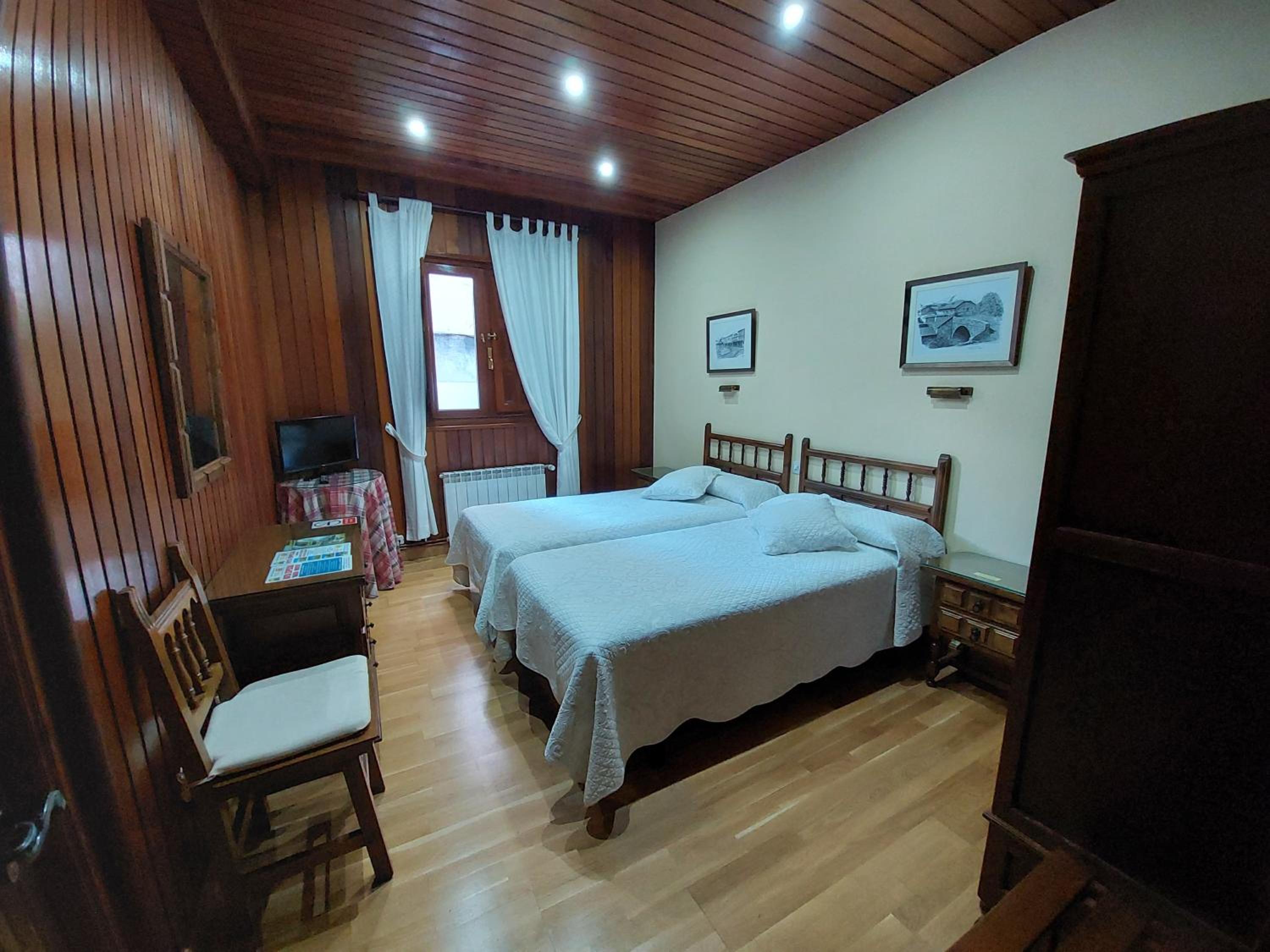 Habitación Doble con Dos Camas Dobles