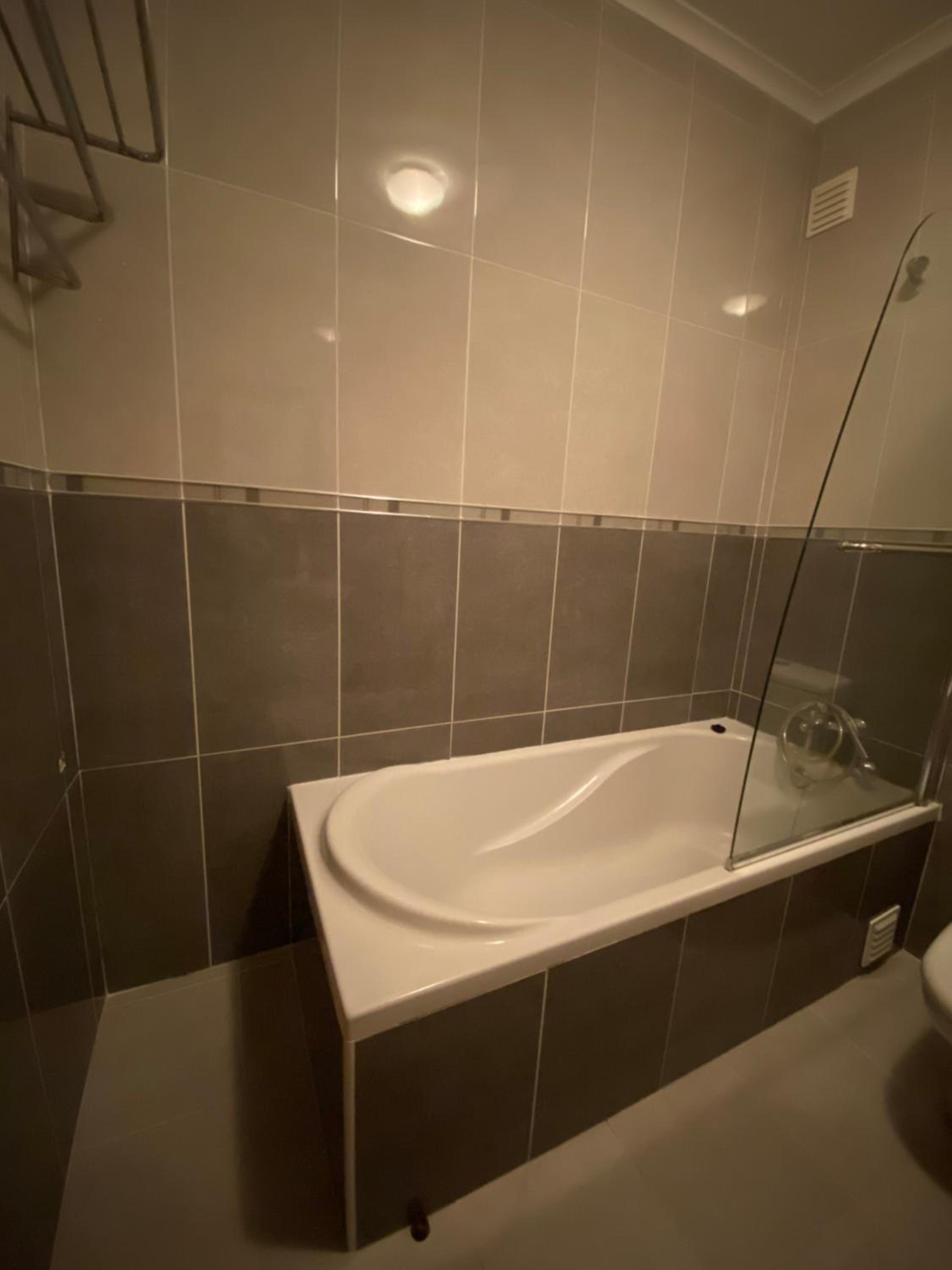 Three-Bedroom Apartment - Photo 4