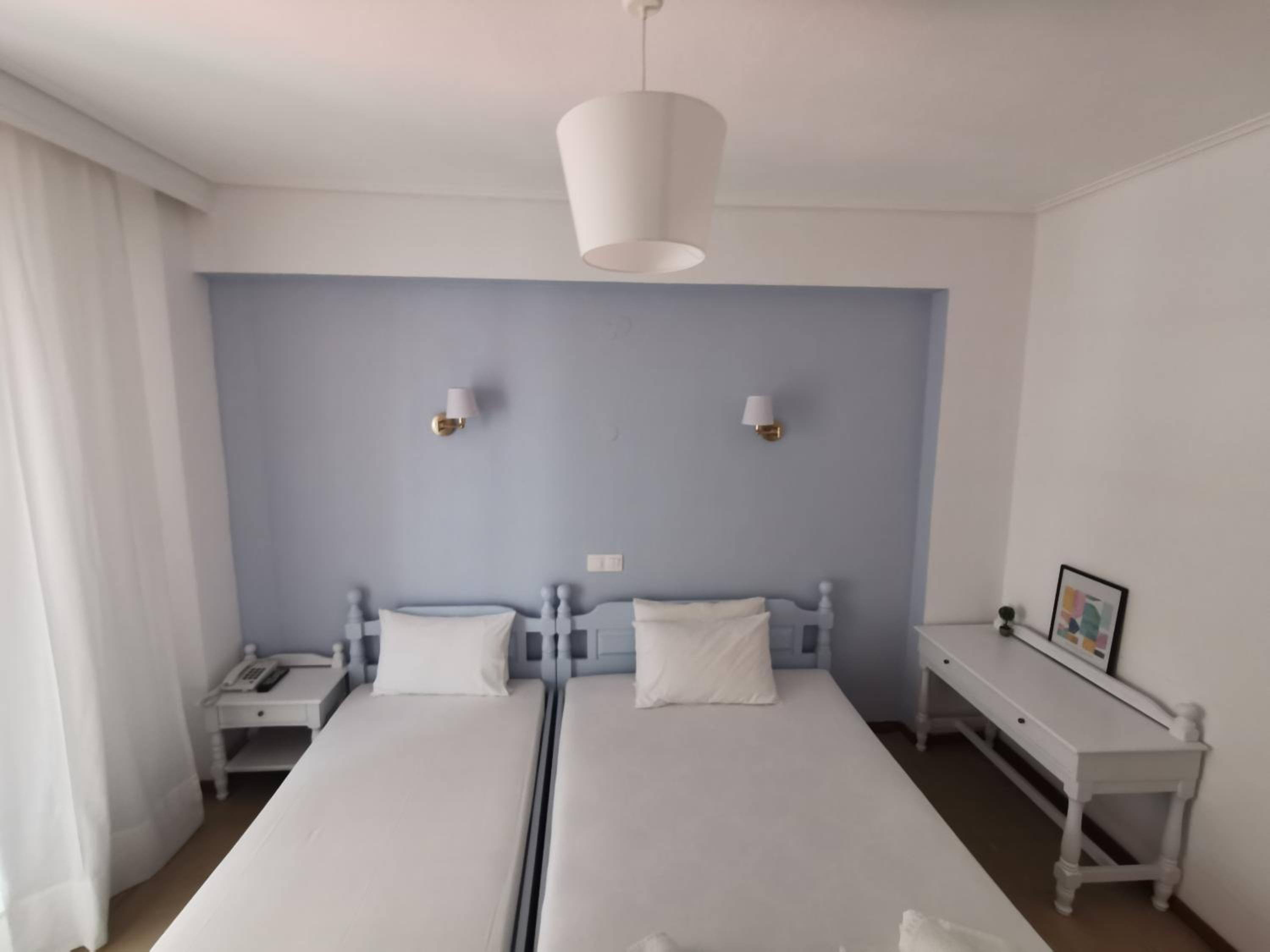 Basic Triple Room photo 2