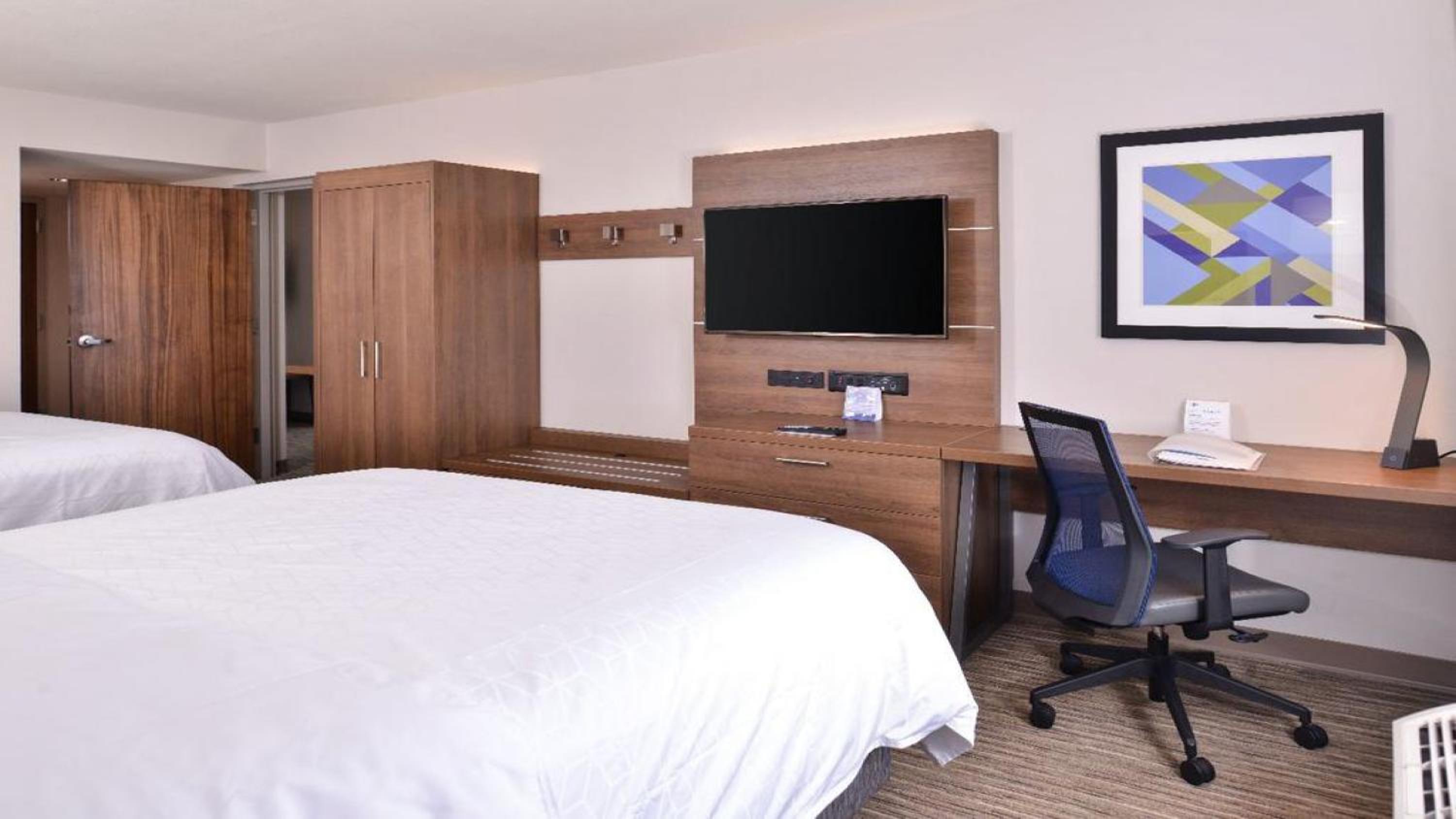 Queen Suite with Two Queen Beds and Sofa Bed