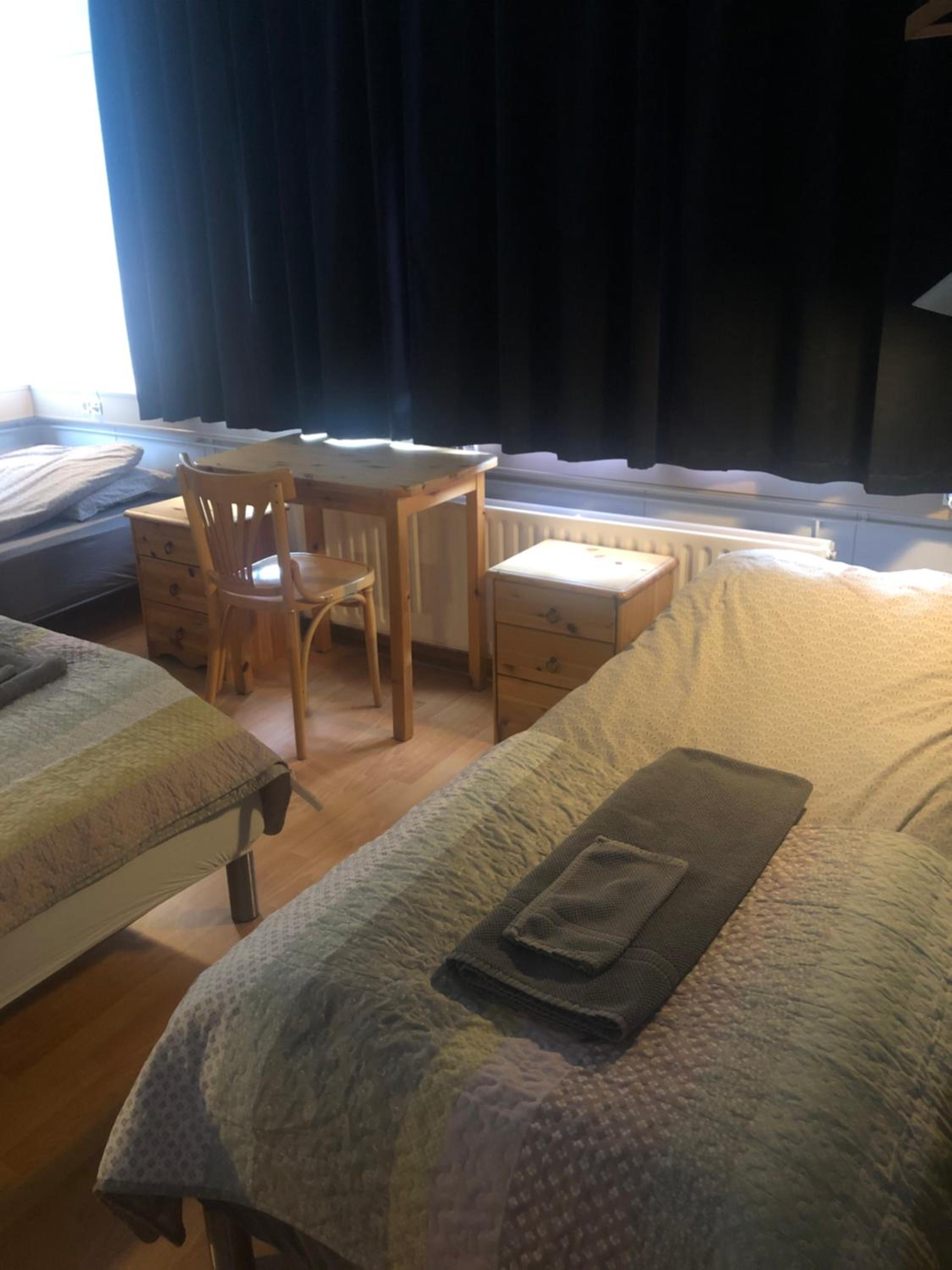 Basic Triple Room with Shared Bathroom photo 2