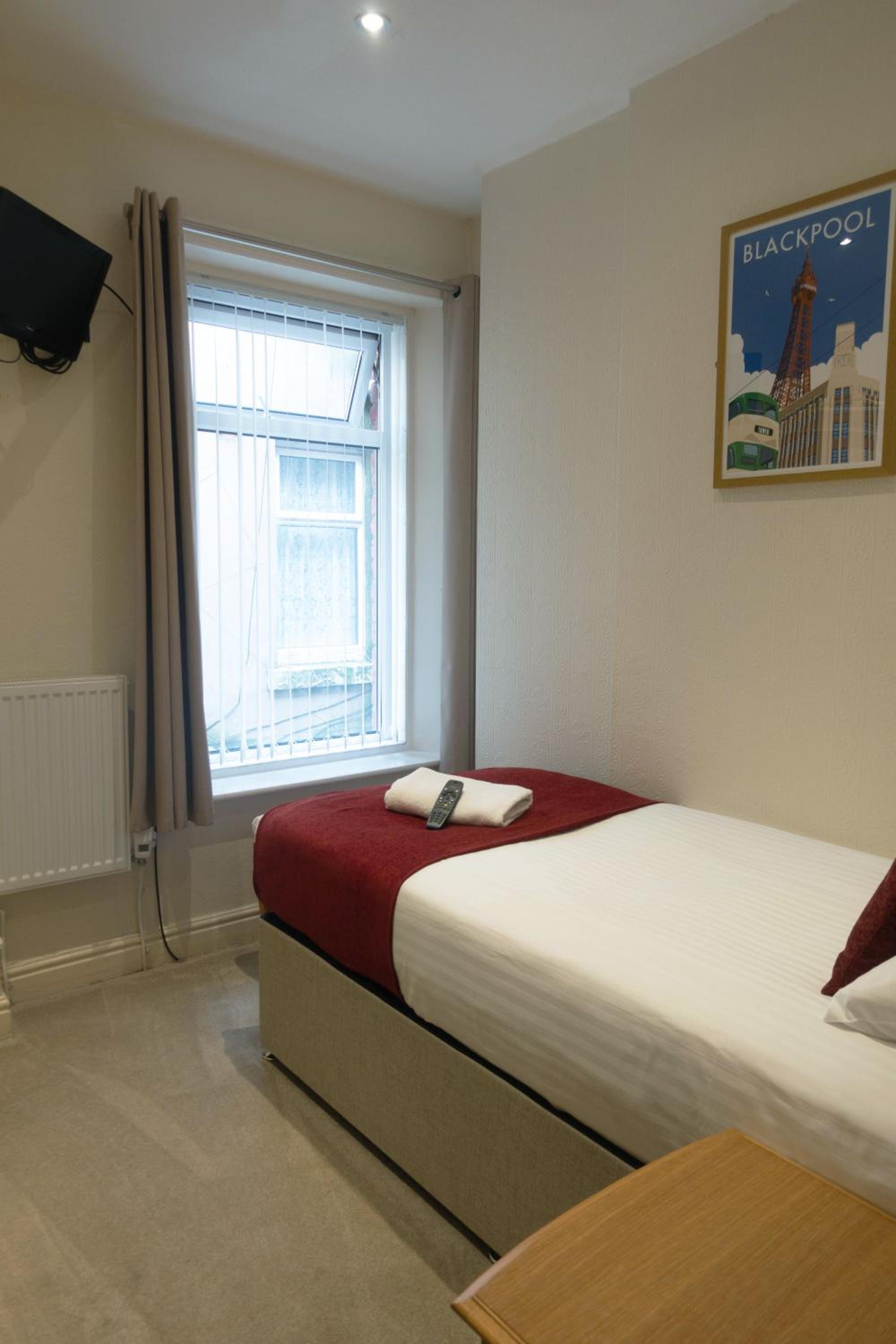Standard Single Room with Shower photo 2