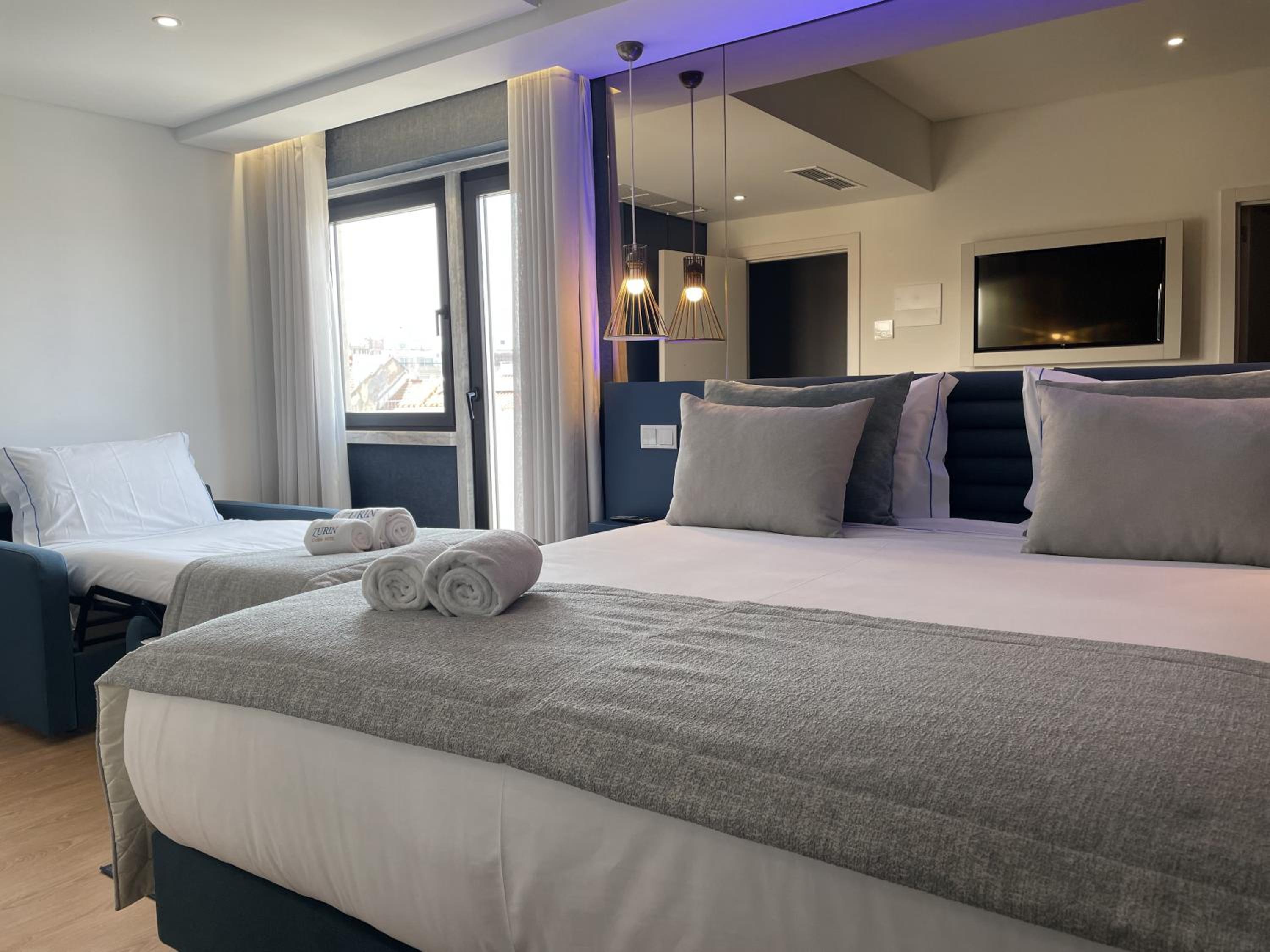 Deluxe Triple Room - Photo 1