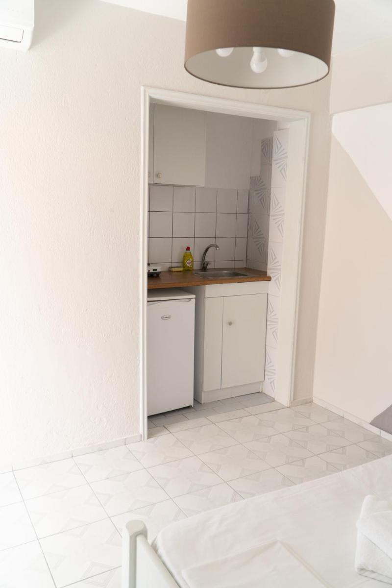 Quadruple Room with Balcony and Partial Sea View photo 1