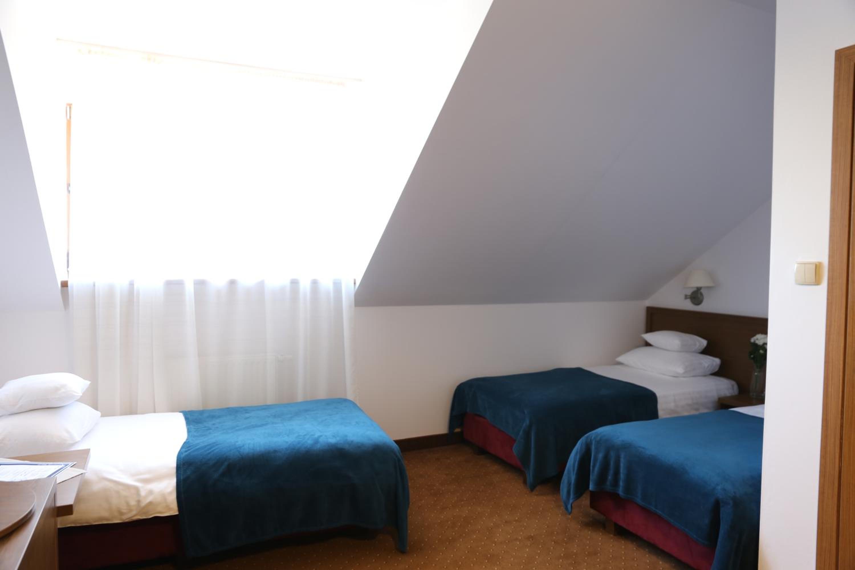 Triple Room - Photo 1