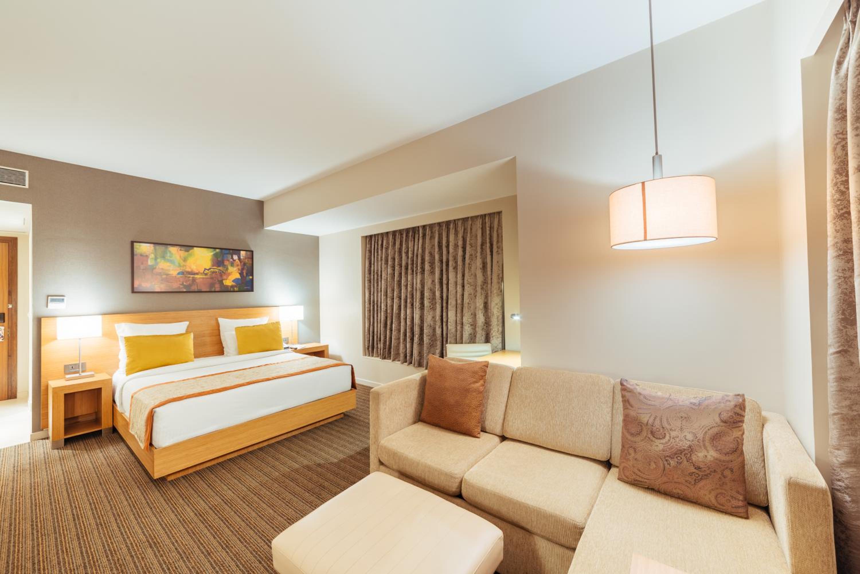 Junior Suite | Unlimited imported liquor at the Premium Lounge (6–8 pm), tea/coffee (10 am–10 pm), one-way airport transfer and 20% off on F&B, Laundry, Spa and Transport Junior Suite | Unlimited imported liquor at the Premium Lounge (6–8 pm), tea/coffee (10 am–10 pm), one-way airport transfer and 20% off on F&B, Laundry, Spa and Transport