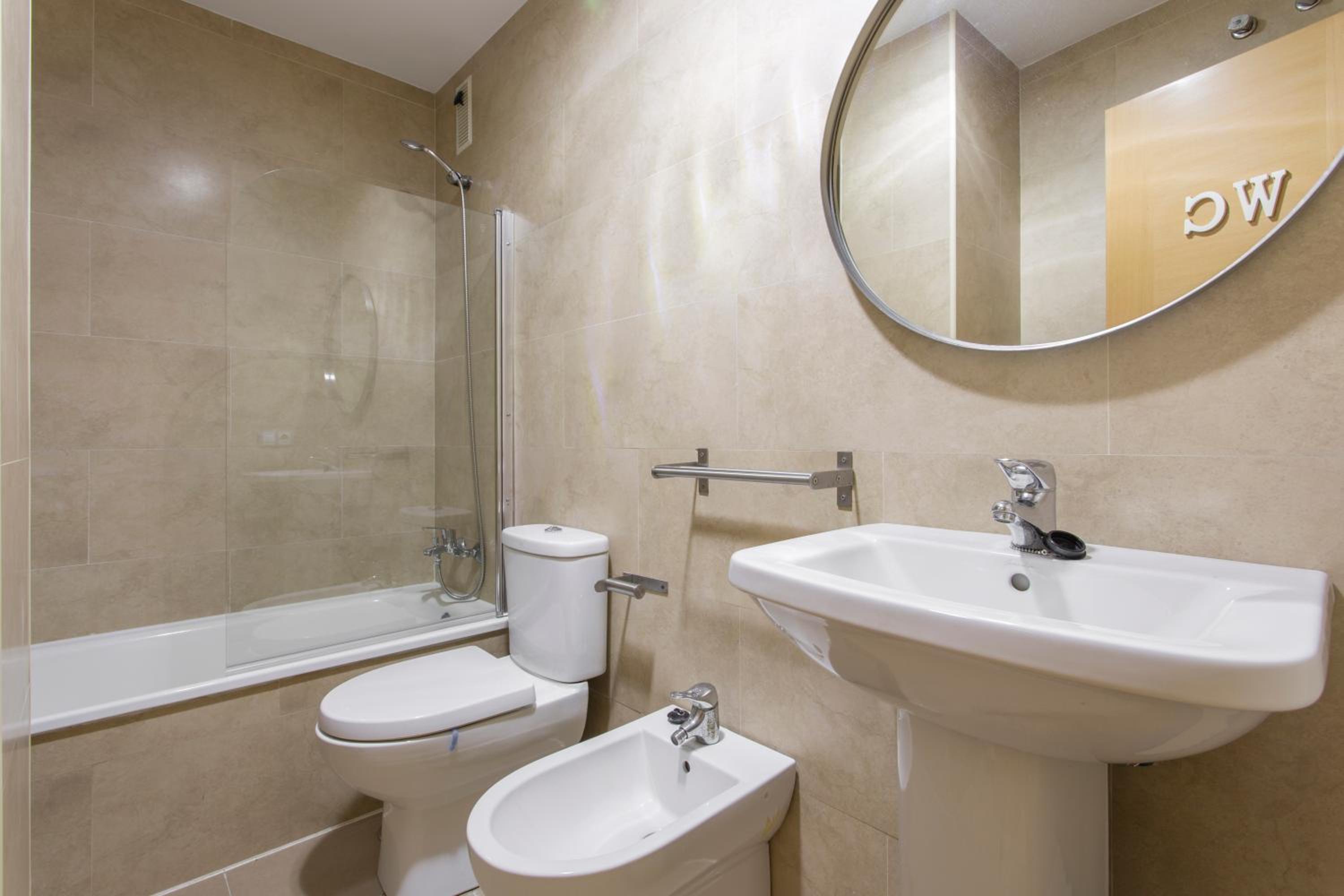 Three-Bedroom Apartment - Photo 19