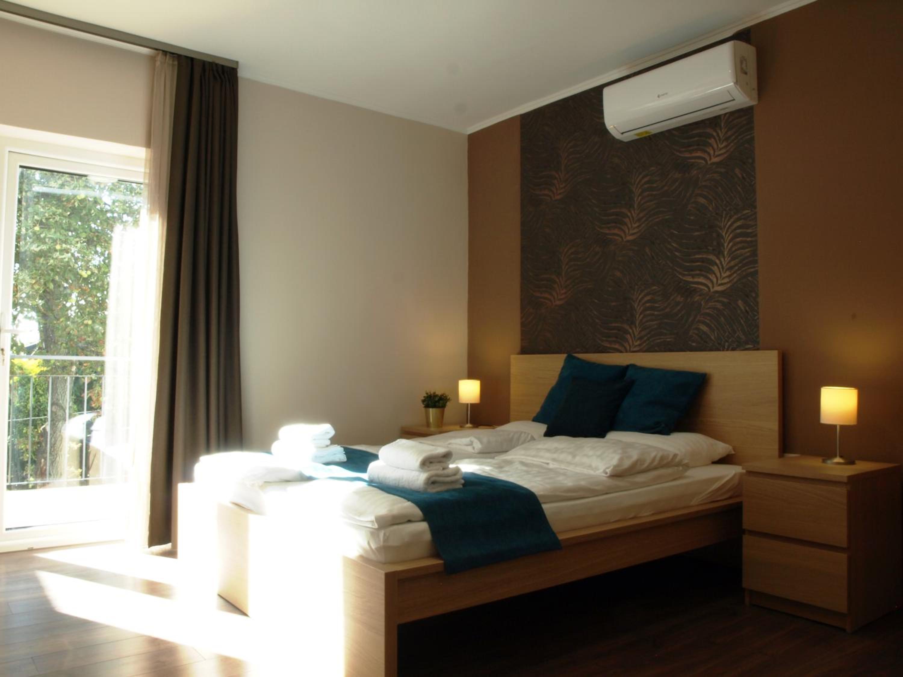 Family Room with Balcony - Photo 3