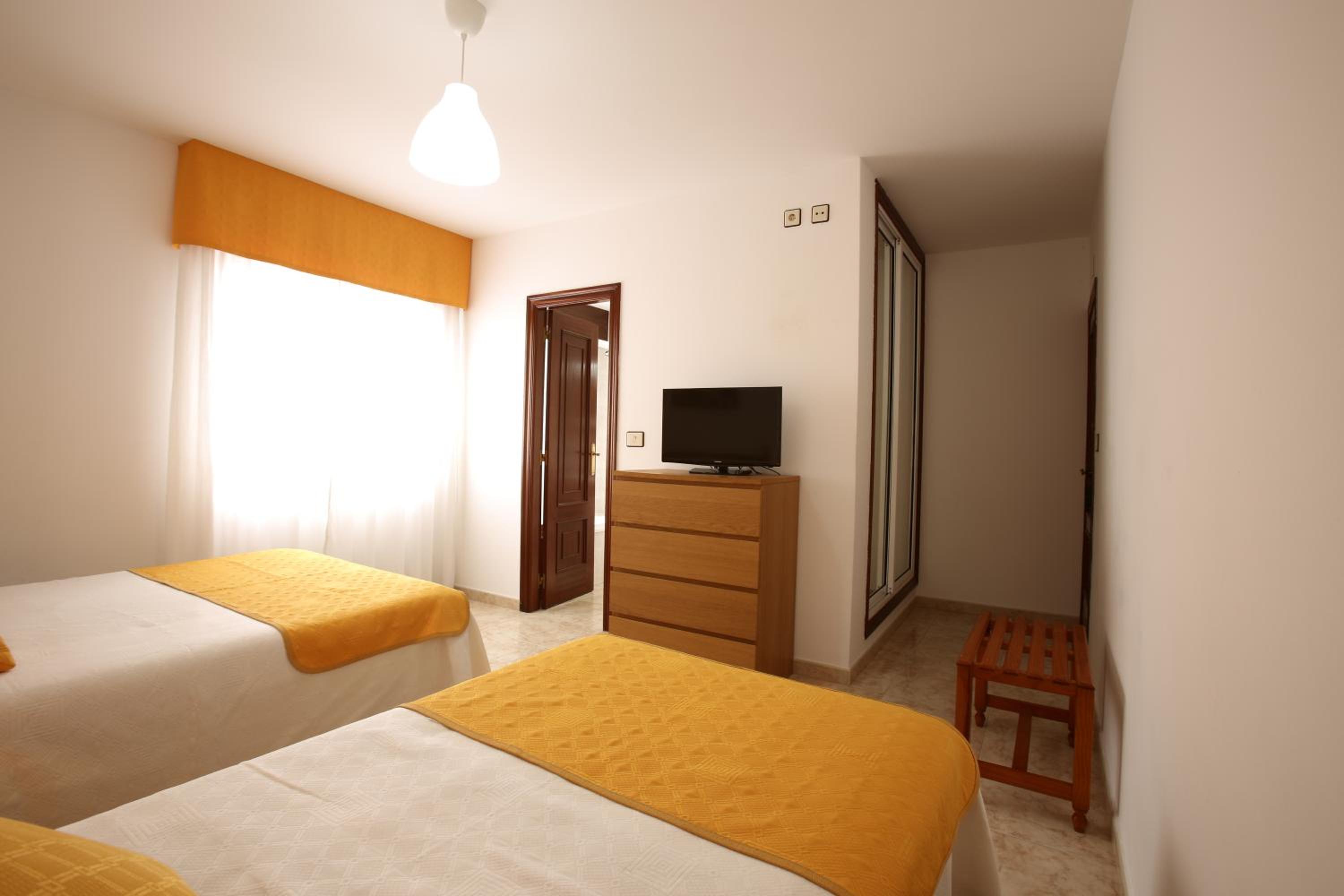 Triple Room (2 Adults + 1 Child) photo 3