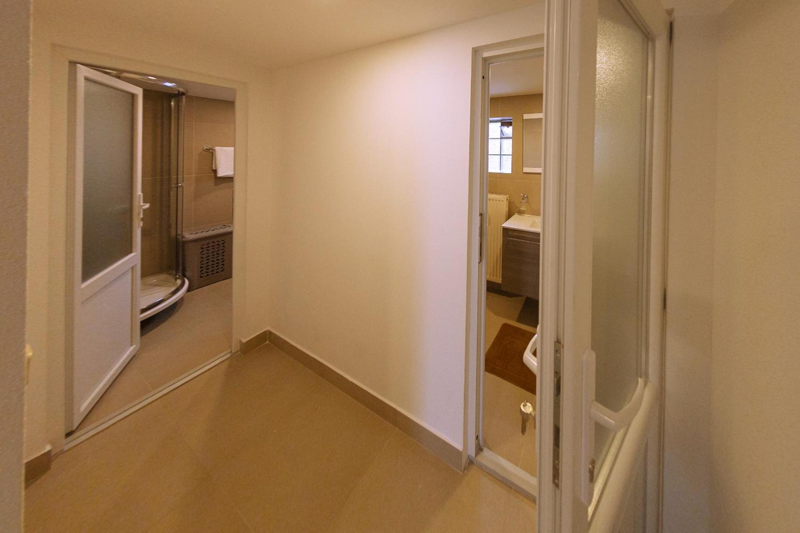 Three-Bedroom House - Photo 14