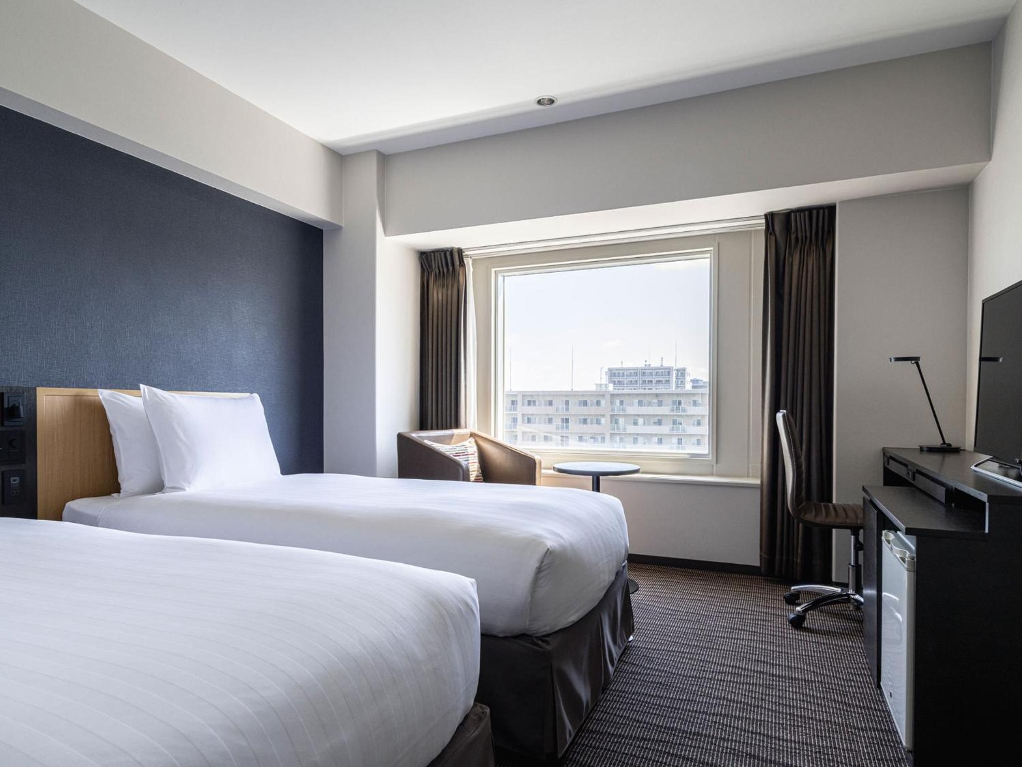 Standard Twin Room - Photo 4