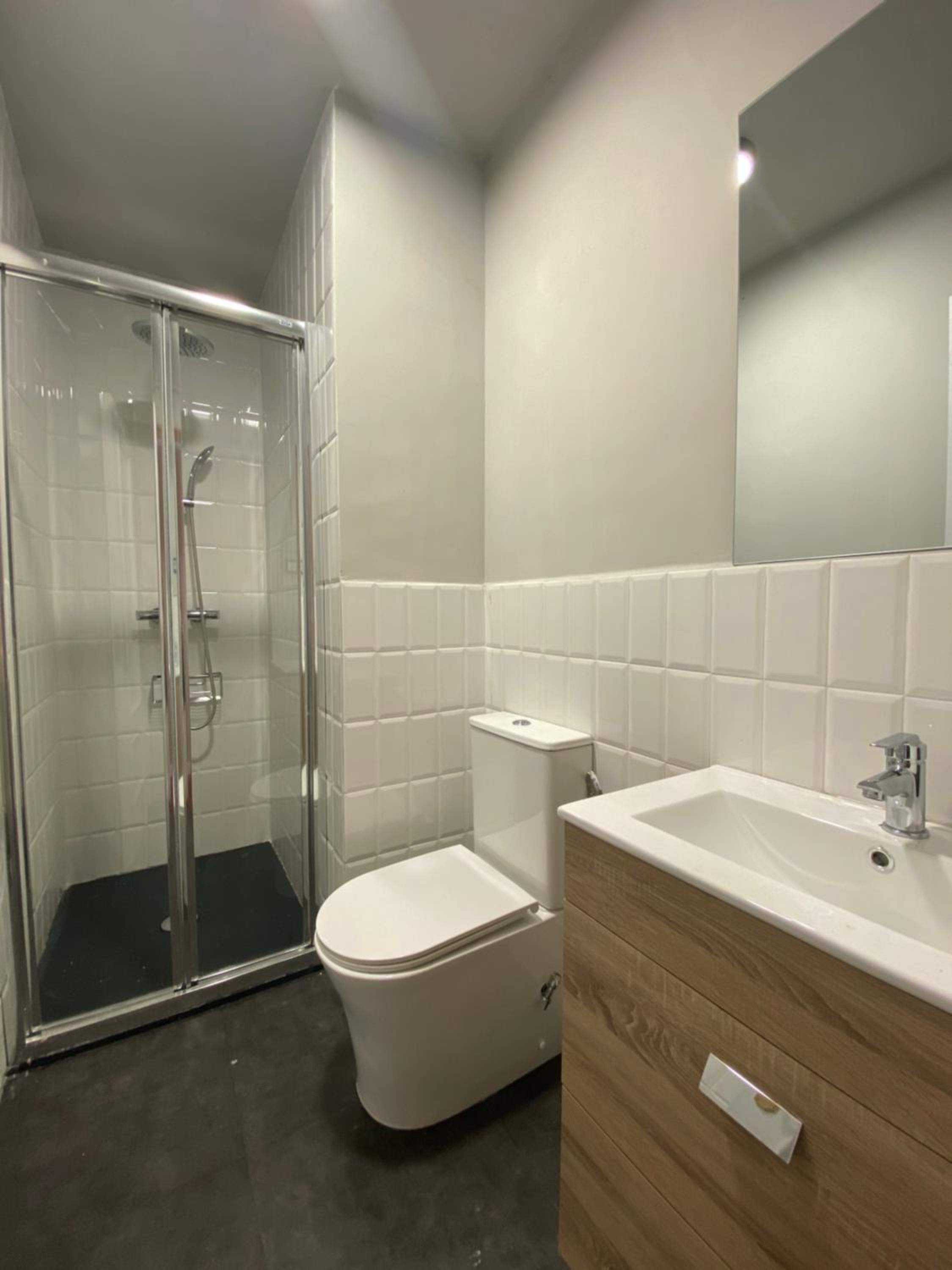 Three-Bedroom Apartment - Photo 6