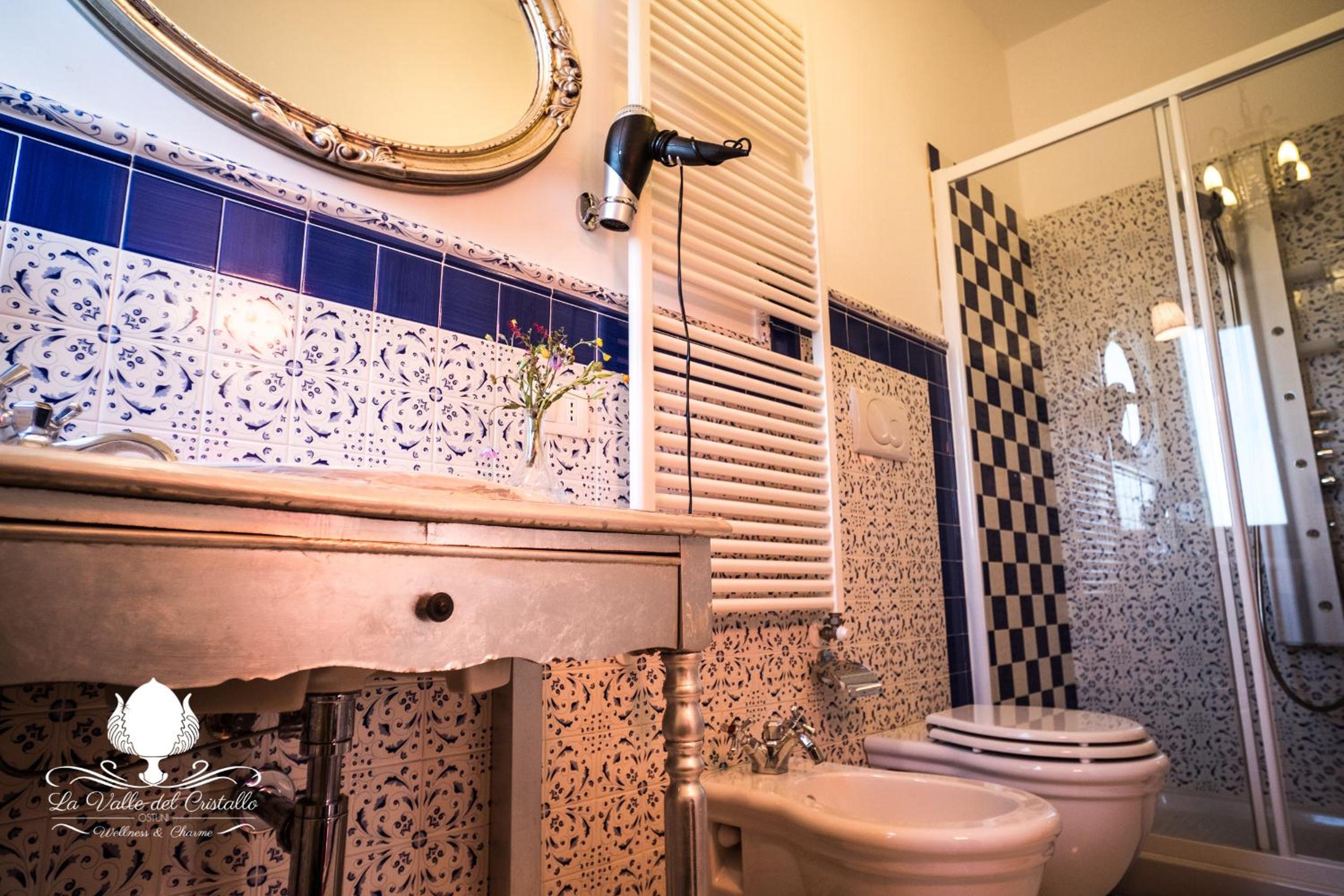 Deluxe Family Suite - Photo 17