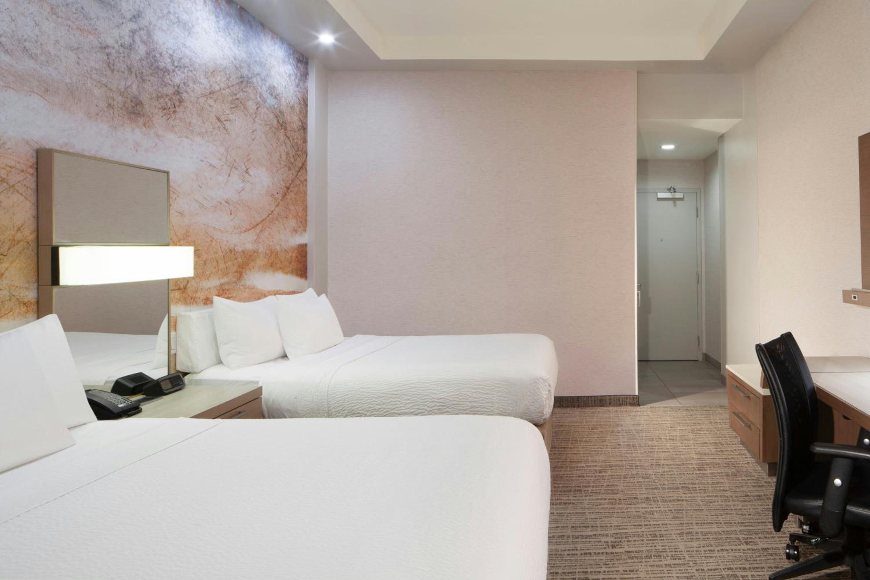 Queen Room with Two Queen Beds and Stadium View - Hearing Accessible