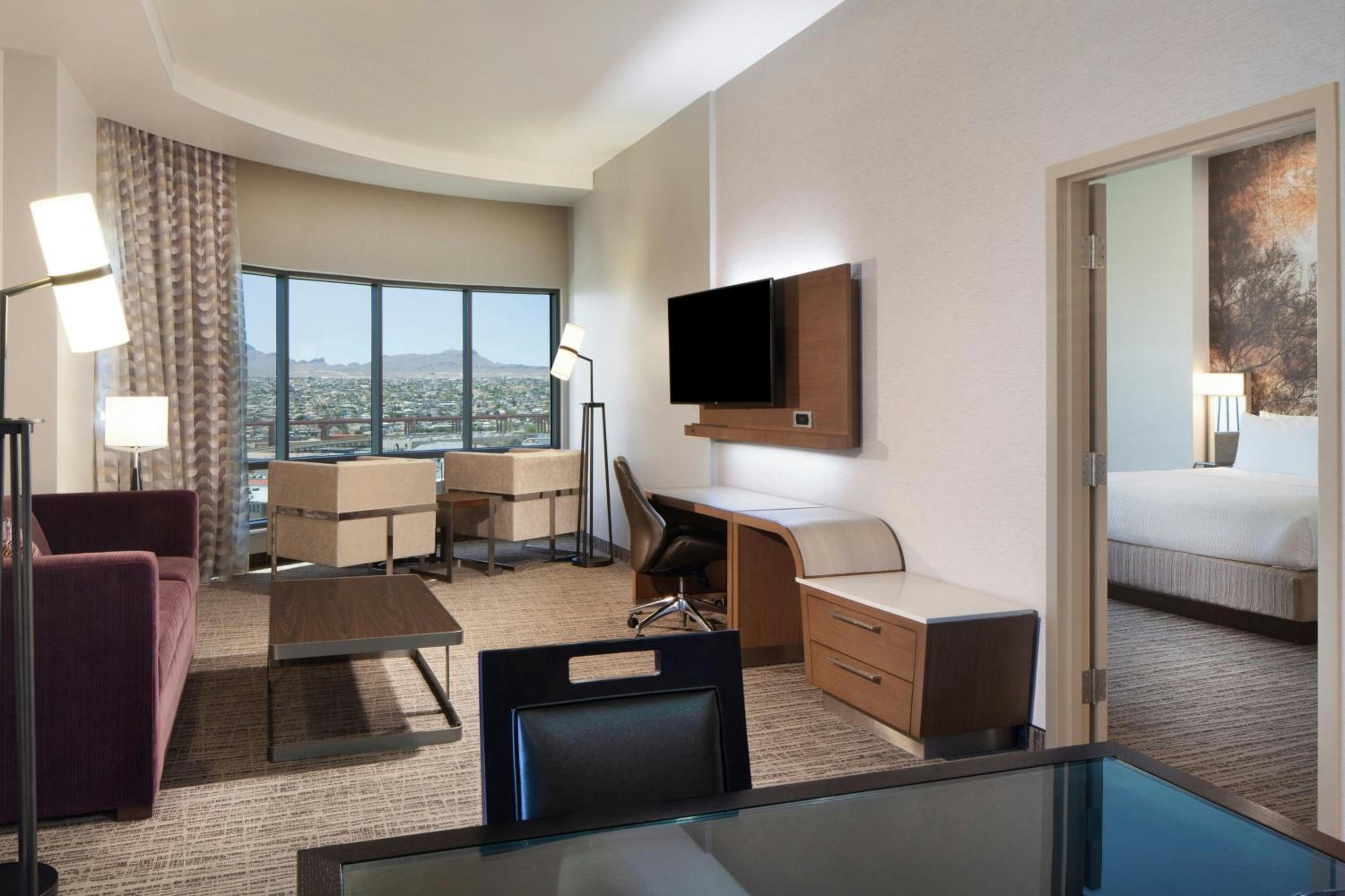 Larger One-Bedroom King Suite with Stadium View, Roll-In Shower and Sofa Bed - Mobility Access