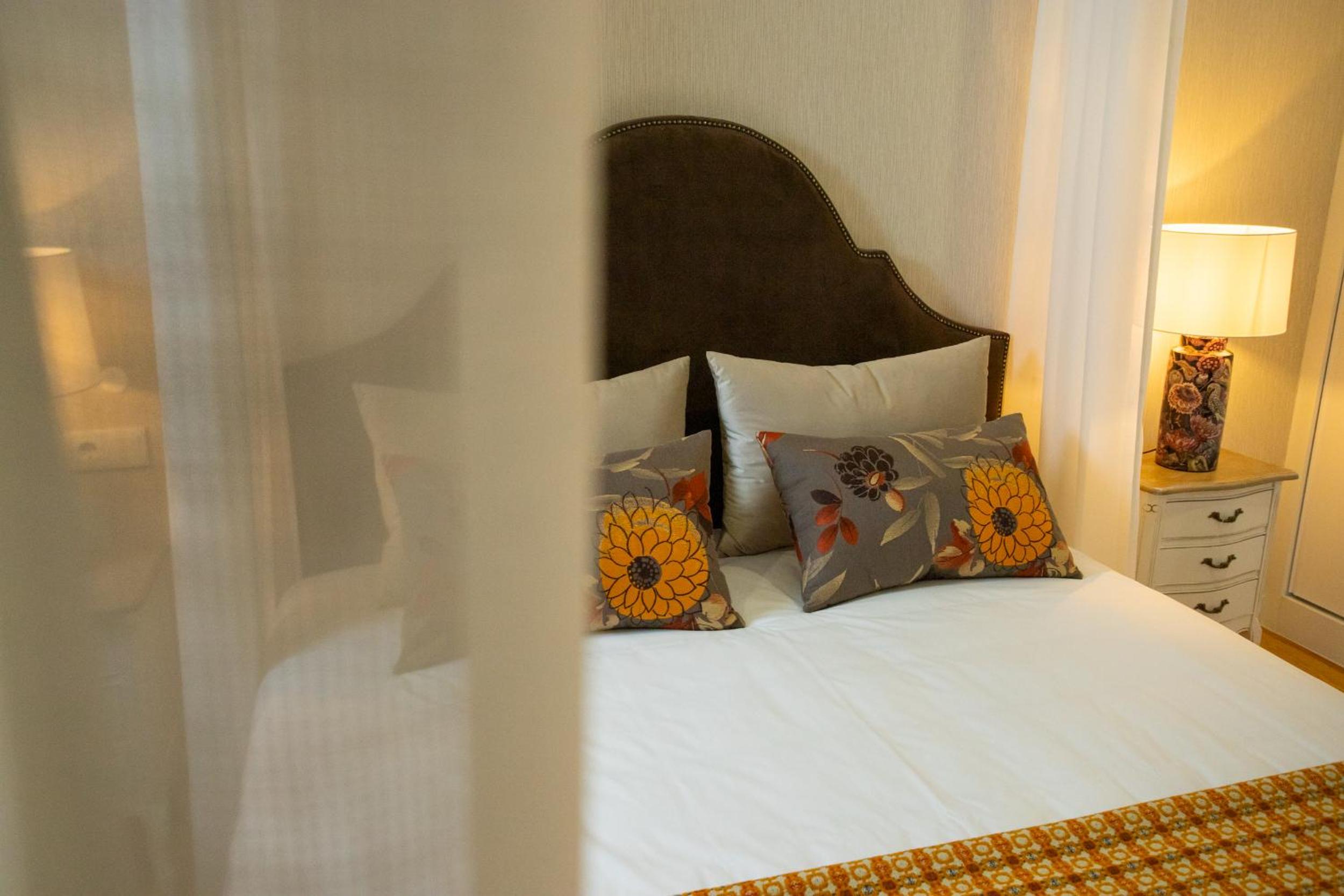 King Suite with Balcony - Photo 1