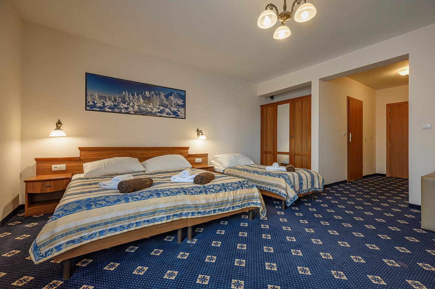 Deluxe Triple Room - Photo 9