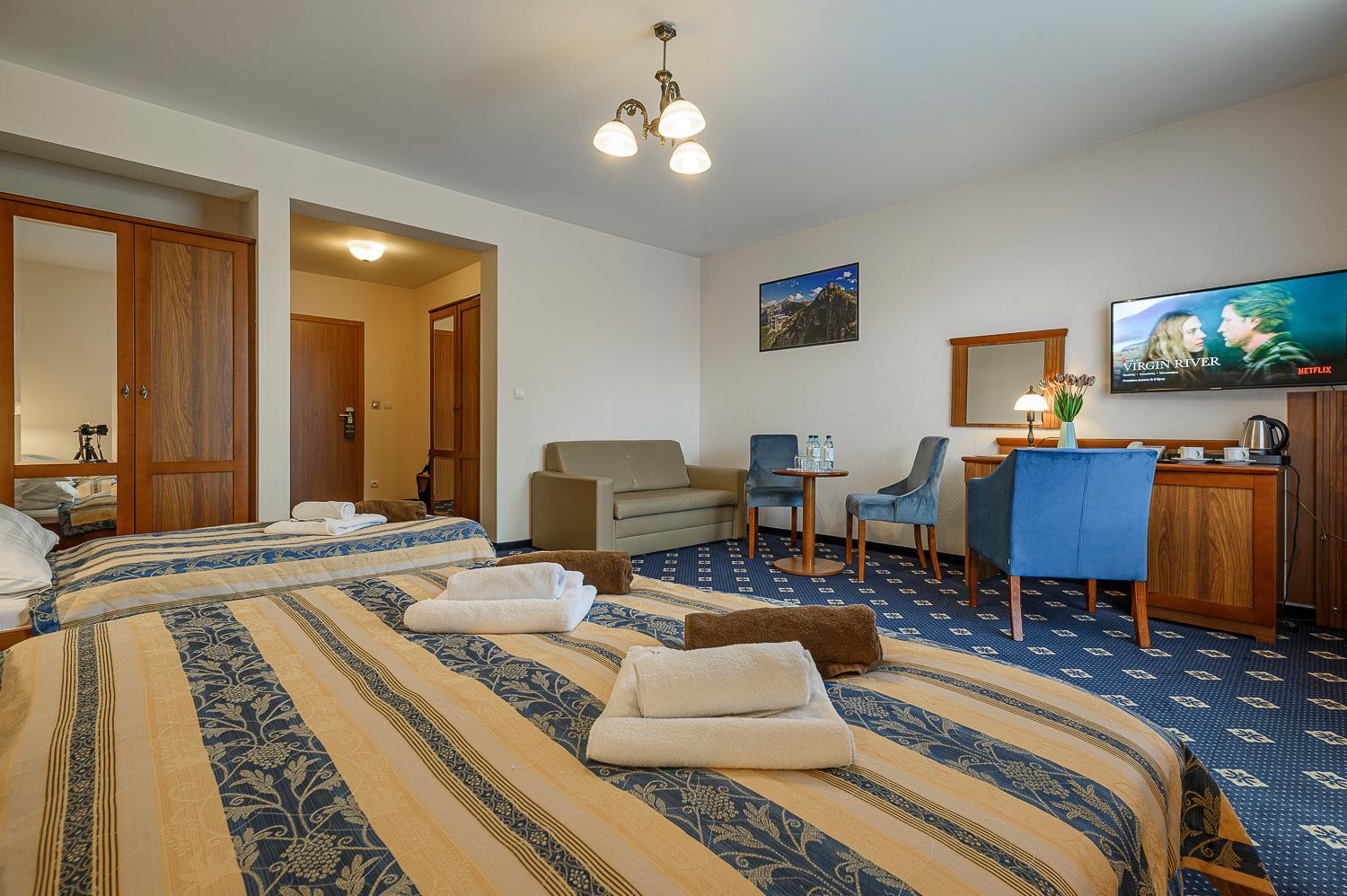 Deluxe Triple Room - Photo 12