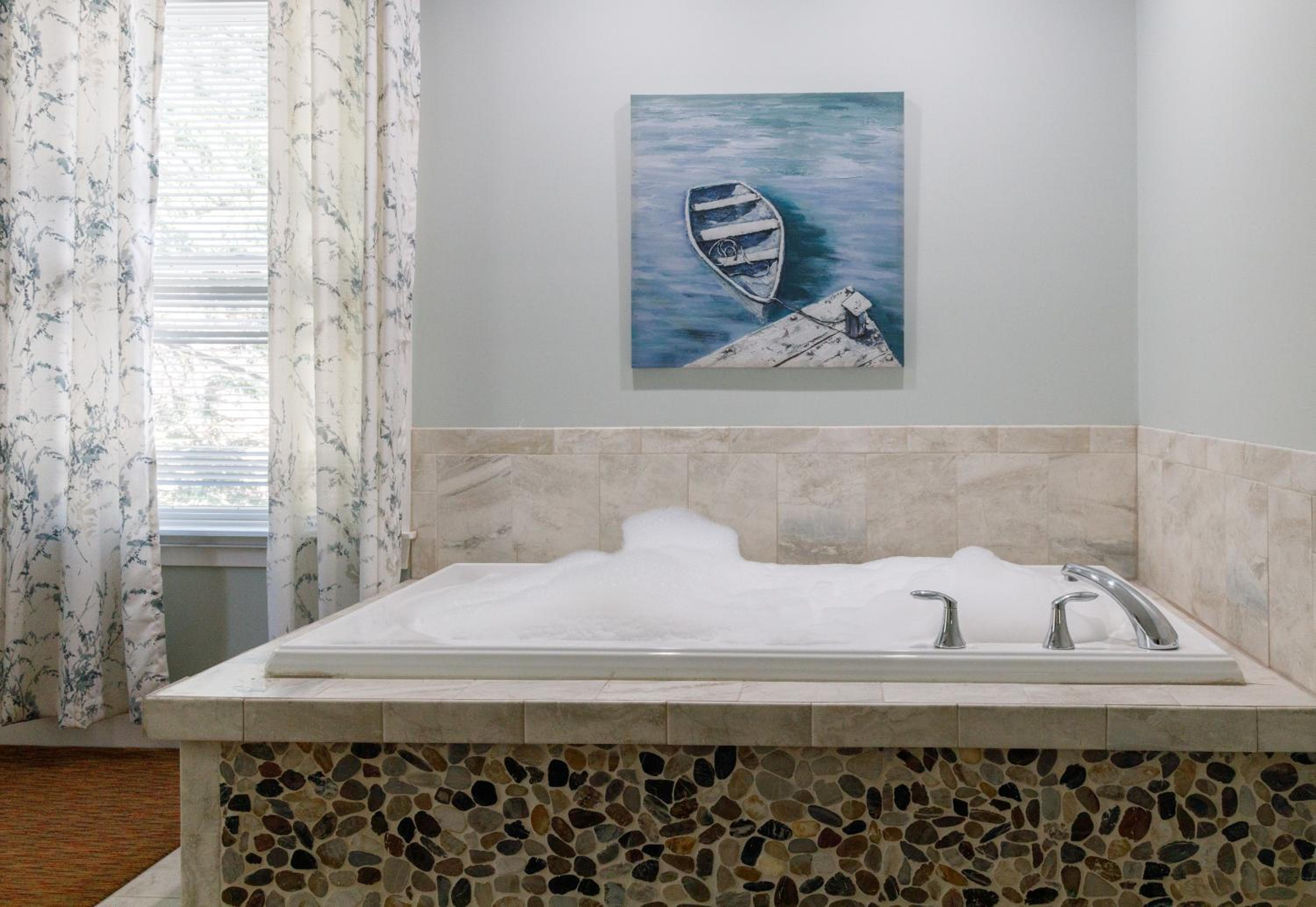 King Jetted Tub and Fireplace Compass Rose Building photo 2