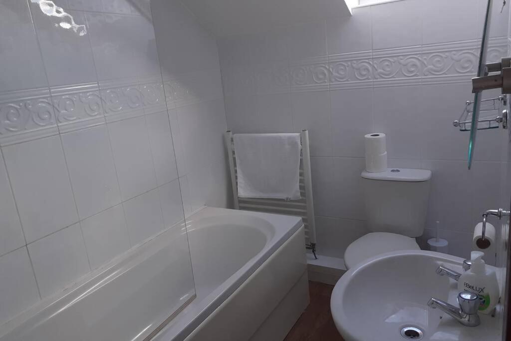 Three-Bedroom House - Photo 15