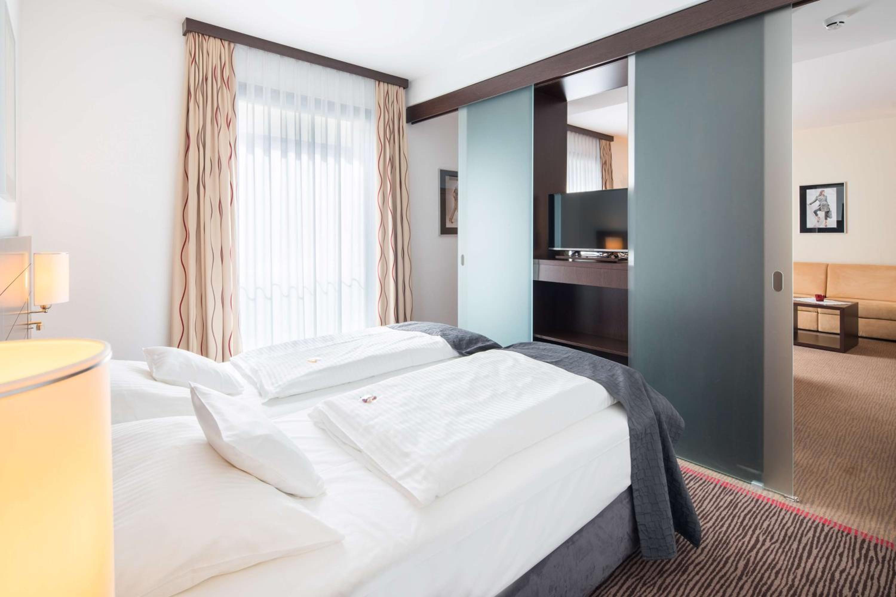 Suite with Two Single Beds and Sofa Bed