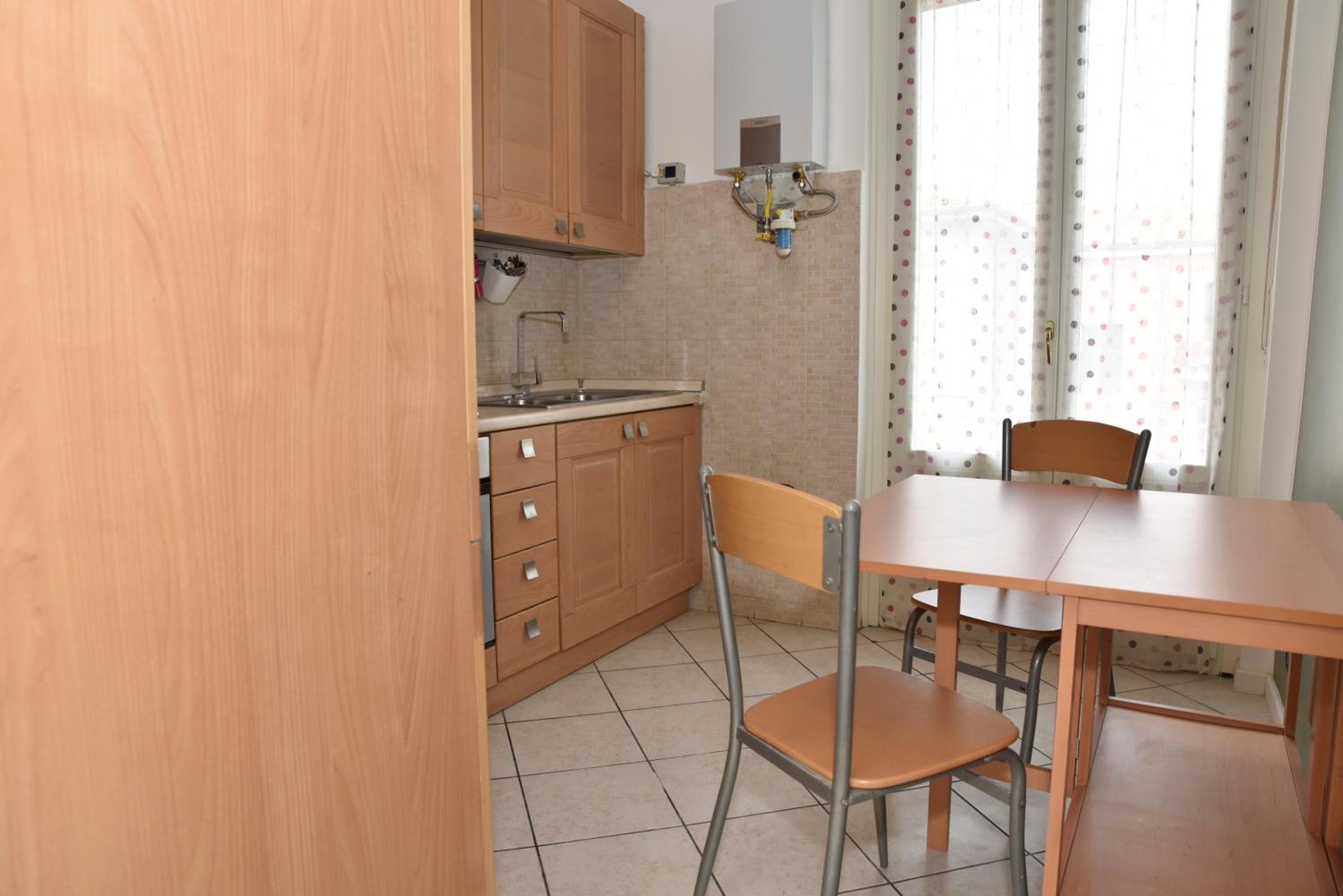 Two-Bedroom Apartment - Photo 17