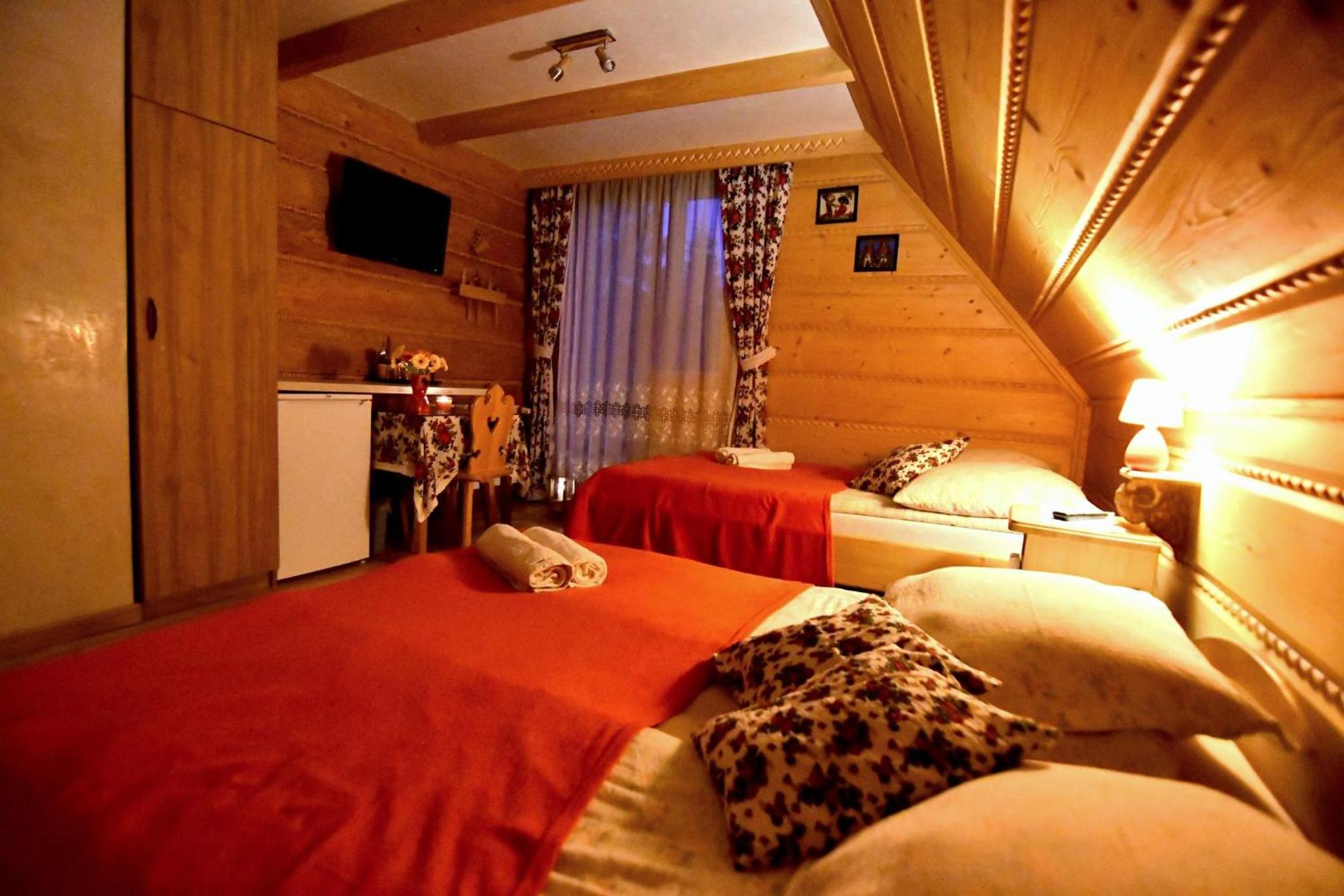 Quadruple Room with Double Bed and Balcony - Photo 1