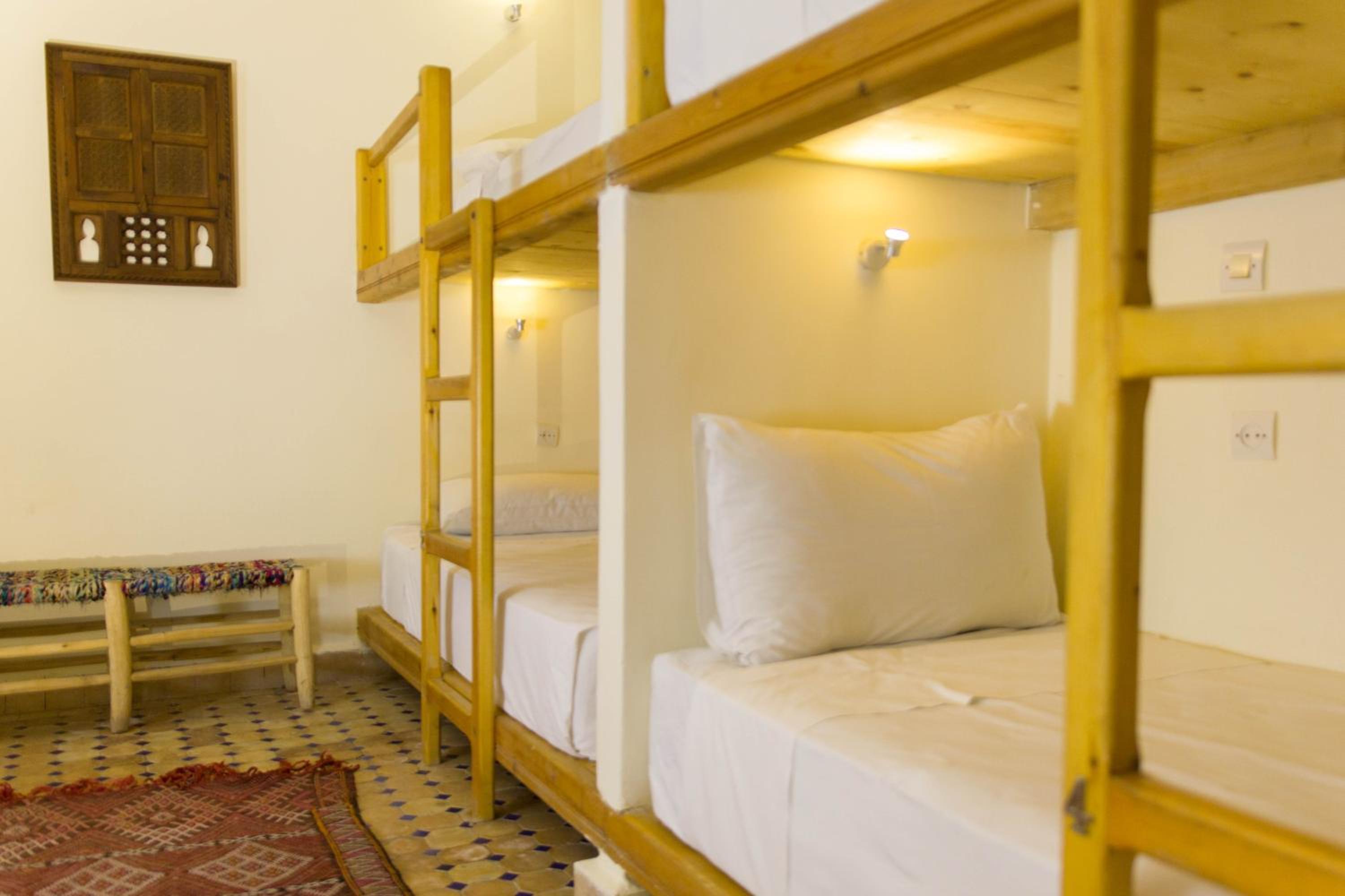 Single Bed In Female Dormitory Room photo 1