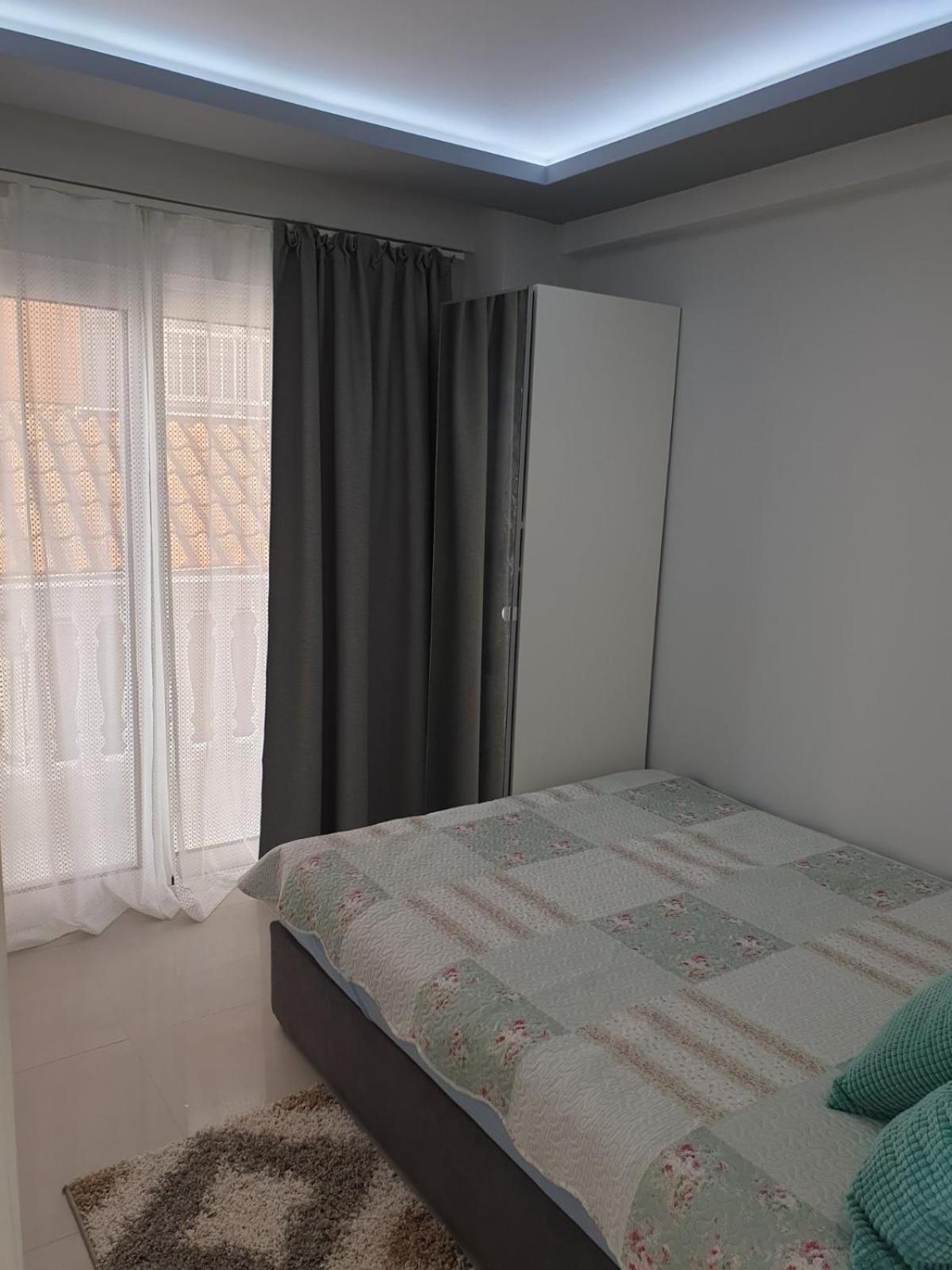 One-Bedroom Apartment with Balcony and Sea View