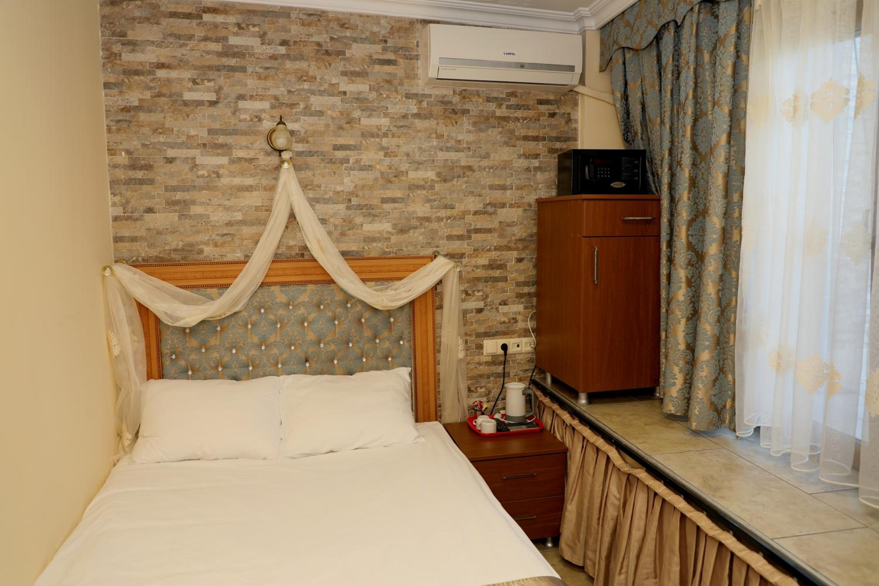 Economy Single Room with Garden View - Basement Floor photo 1