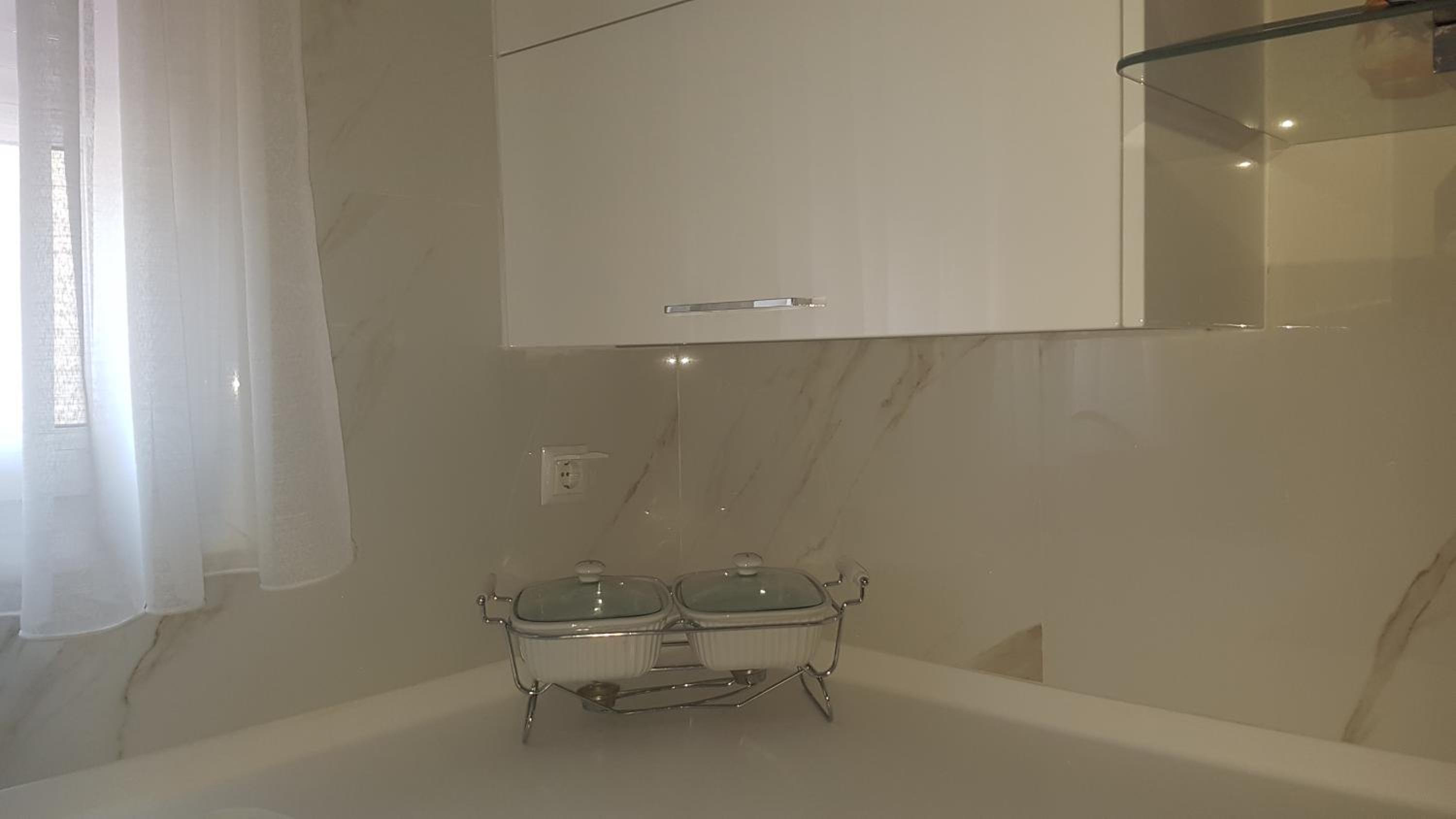 Three-Bedroom Apartment - Photo 26