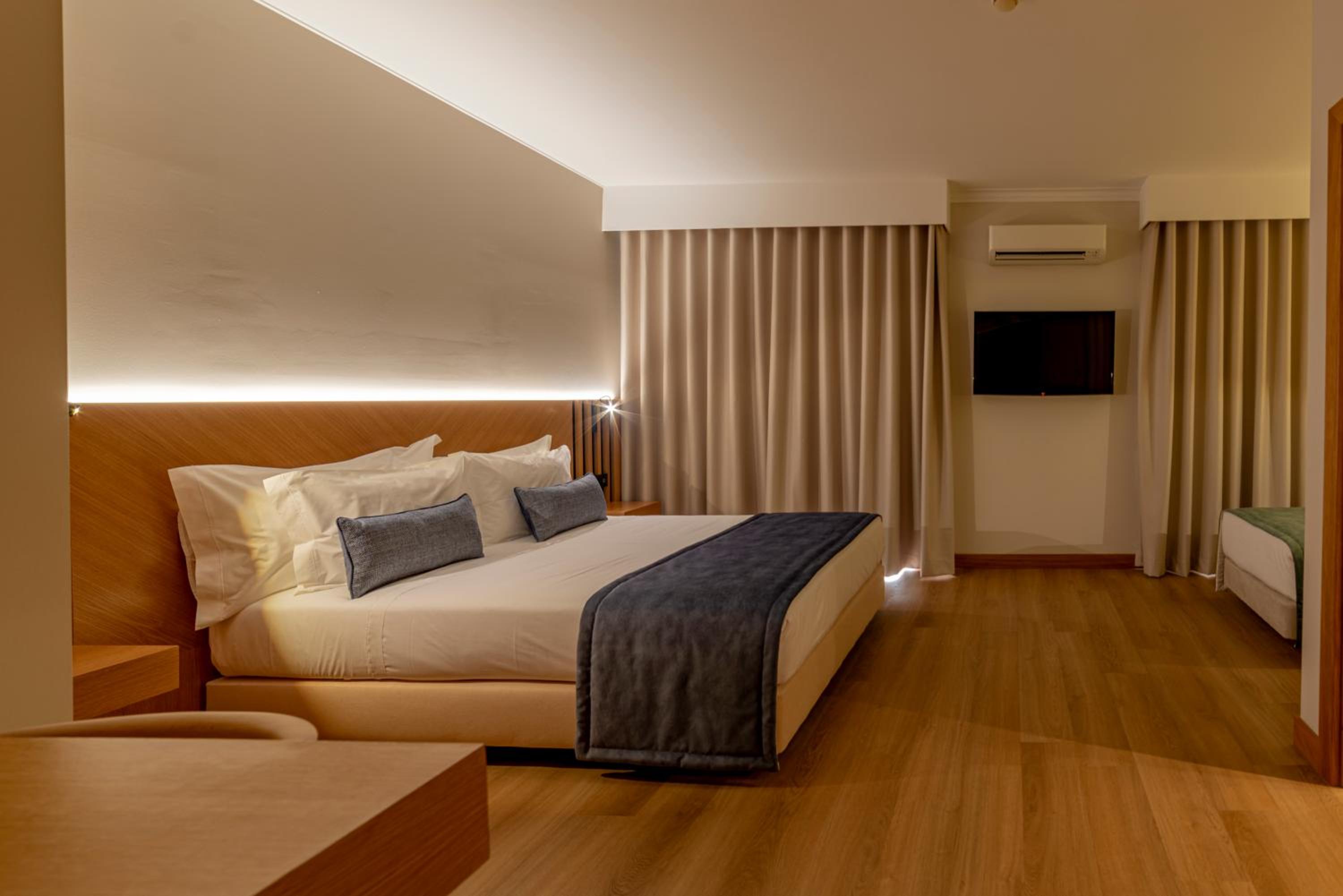 Quarto Duplo com Cama Extra (3 Adultos)