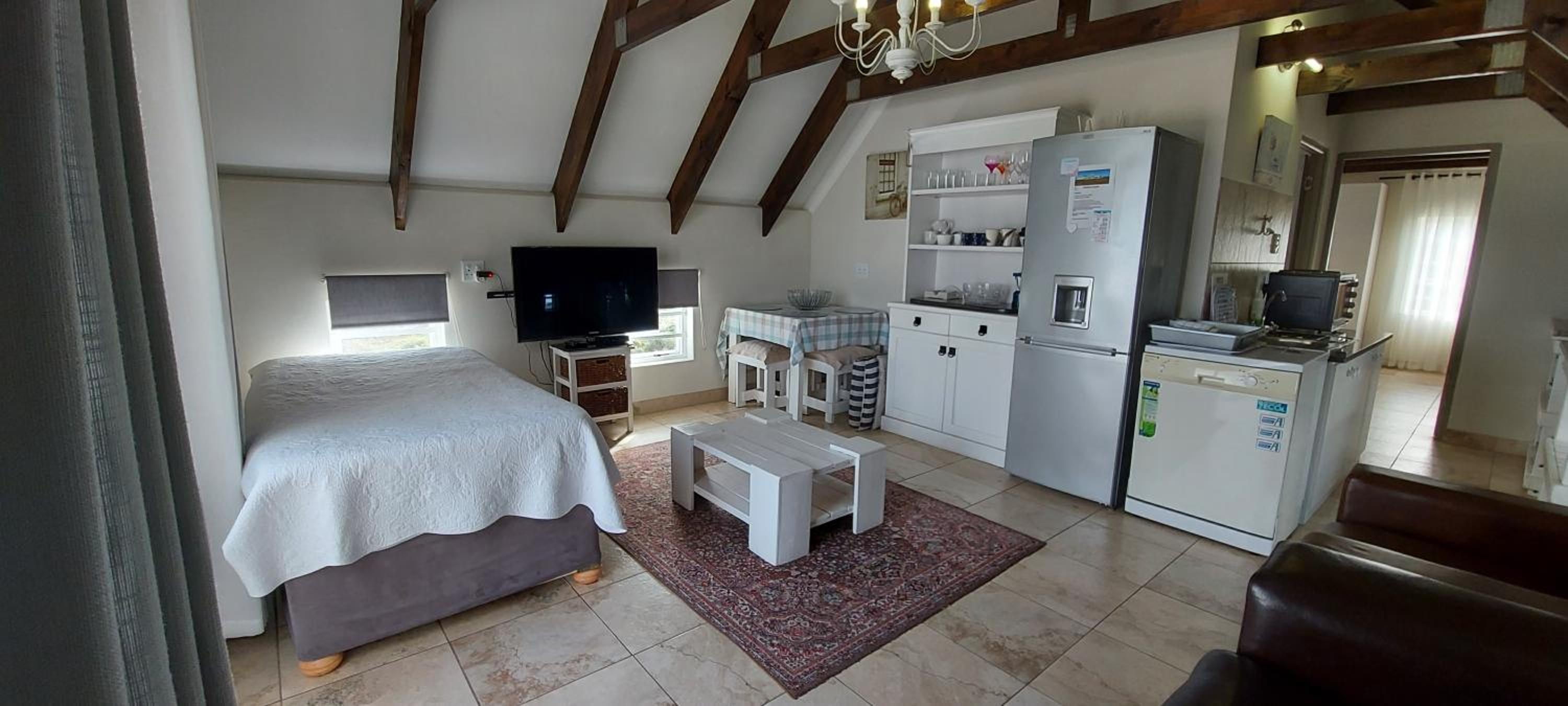 One-Bedroom Apartment with Balcony and Sea View