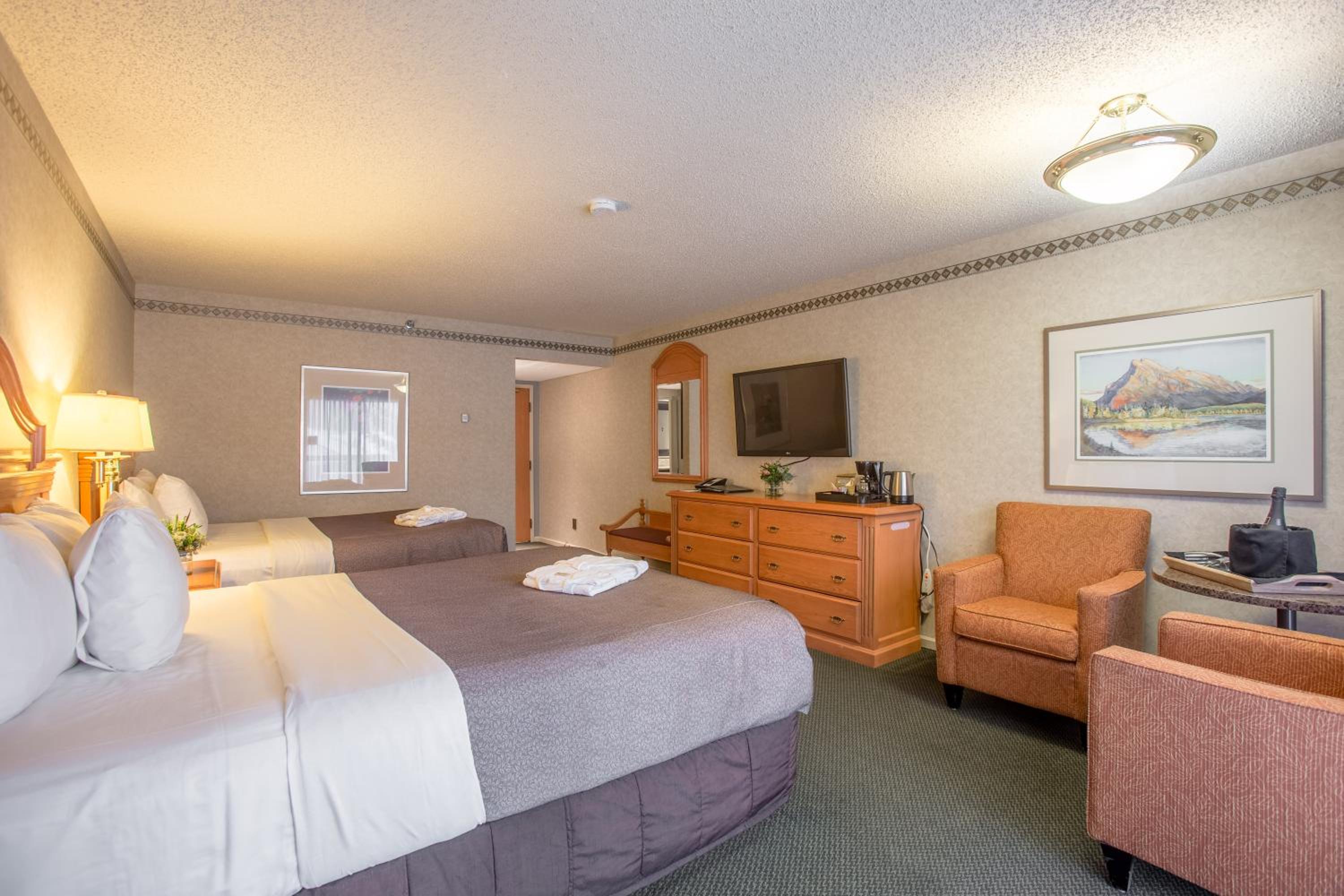 Superior Queen Room with Two Queen Beds - Photo 1