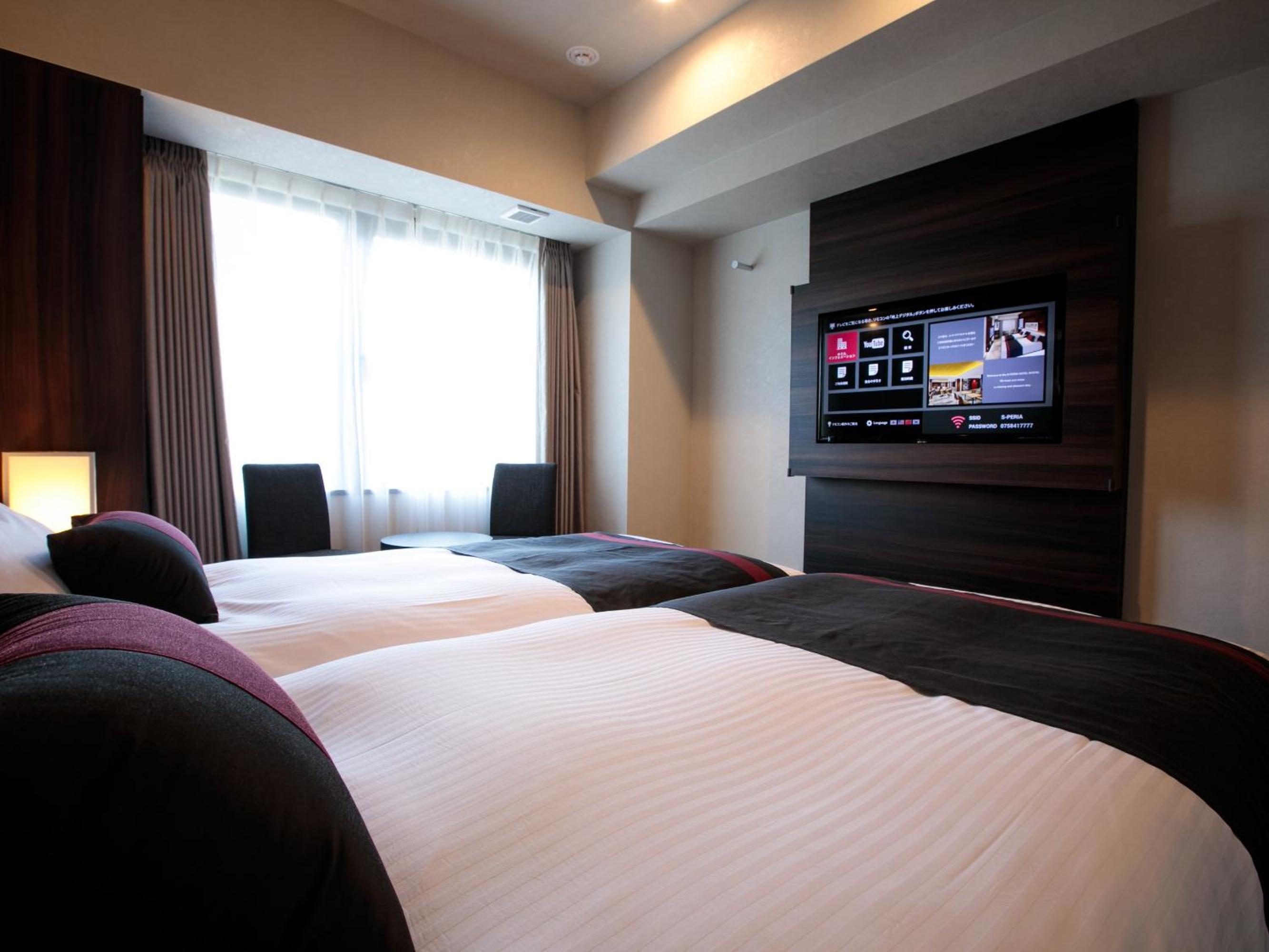 Twin Room - Photo 15