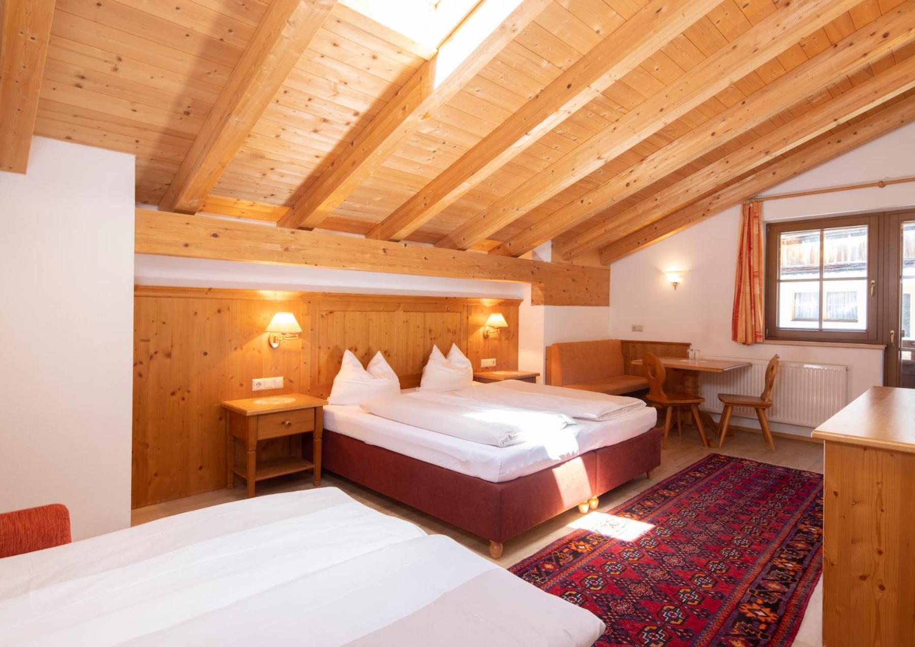 Quadruple Room (2 Adults + 2 Children)