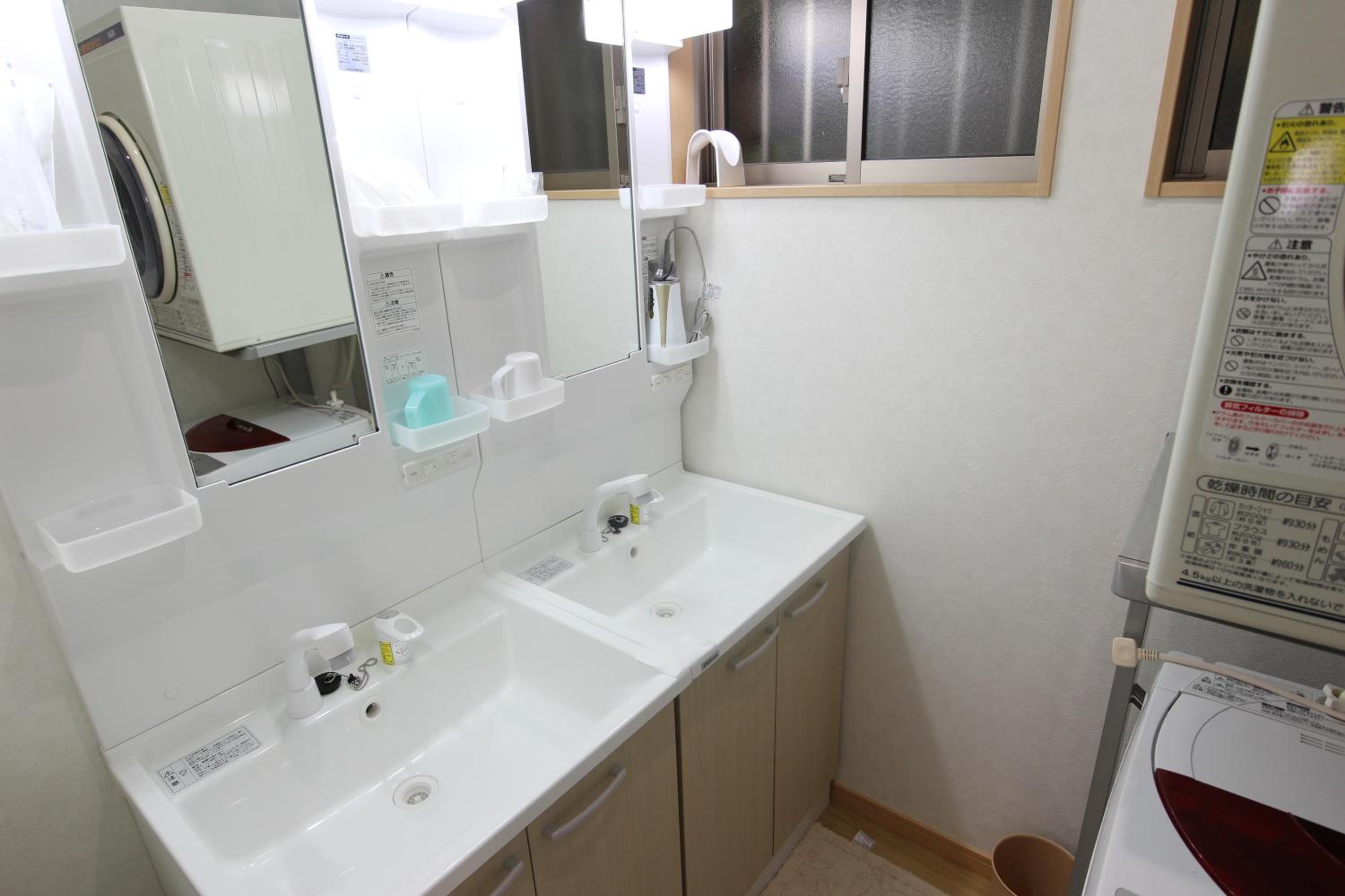 Three-Bedroom House - Photo 16