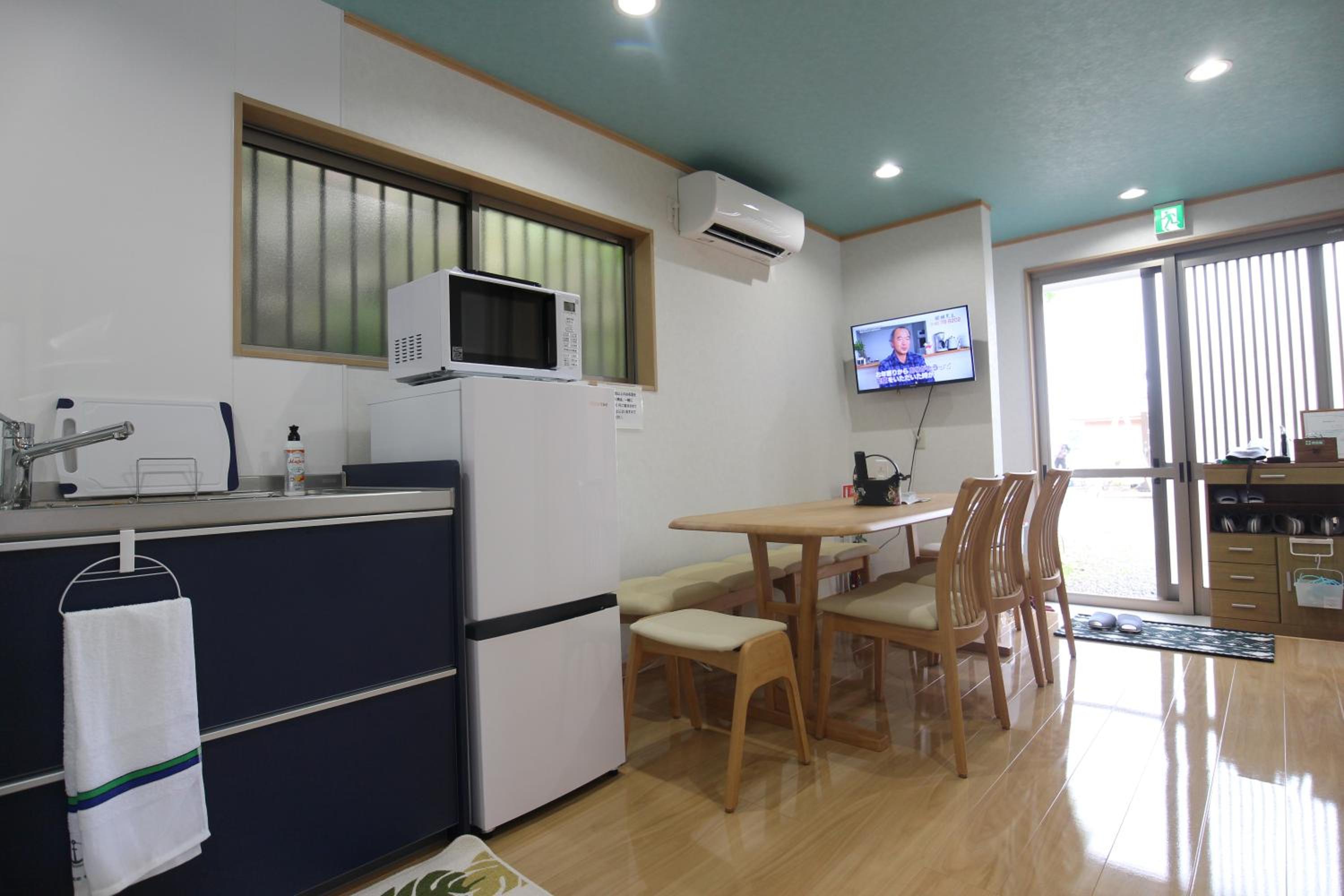 Three-Bedroom House - Photo 17
