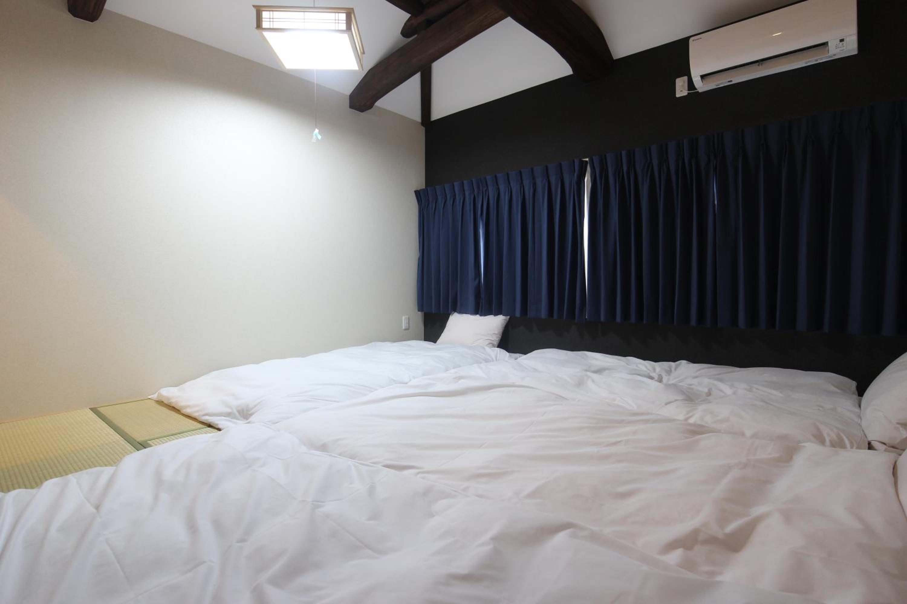 Three-Bedroom House - Photo 20