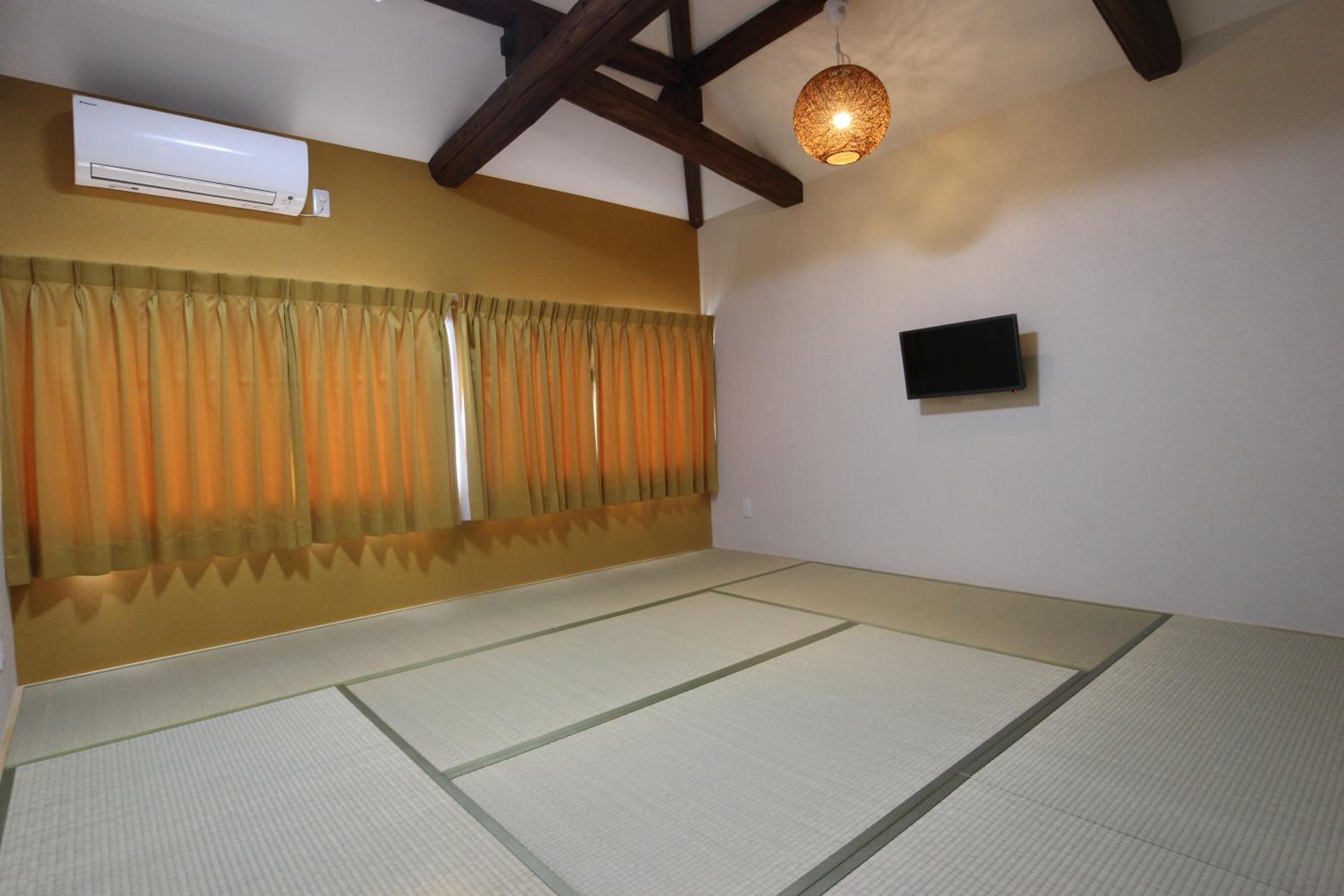 Three-Bedroom House - Photo 24