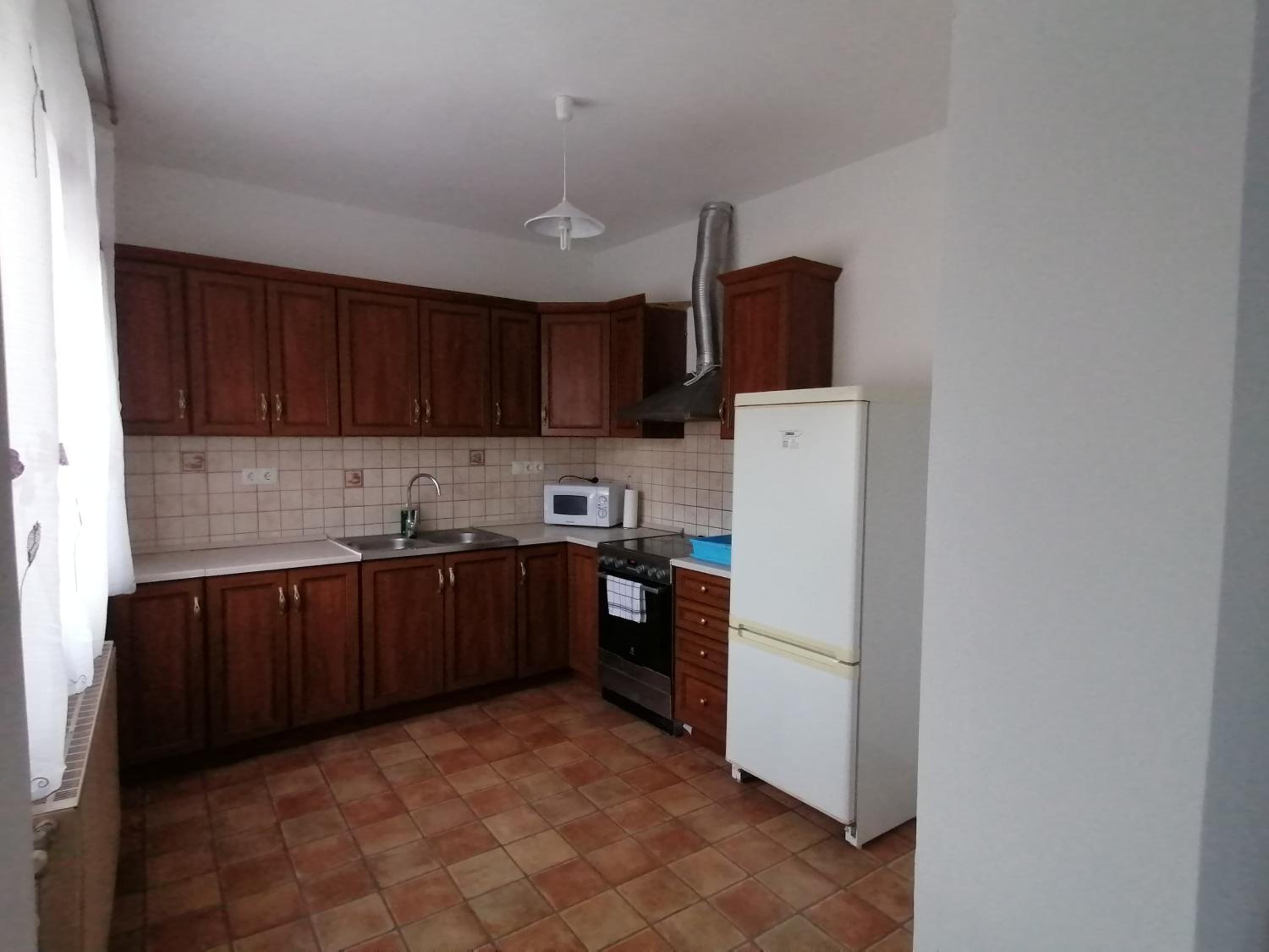 Three-Bedroom House - Photo 12
