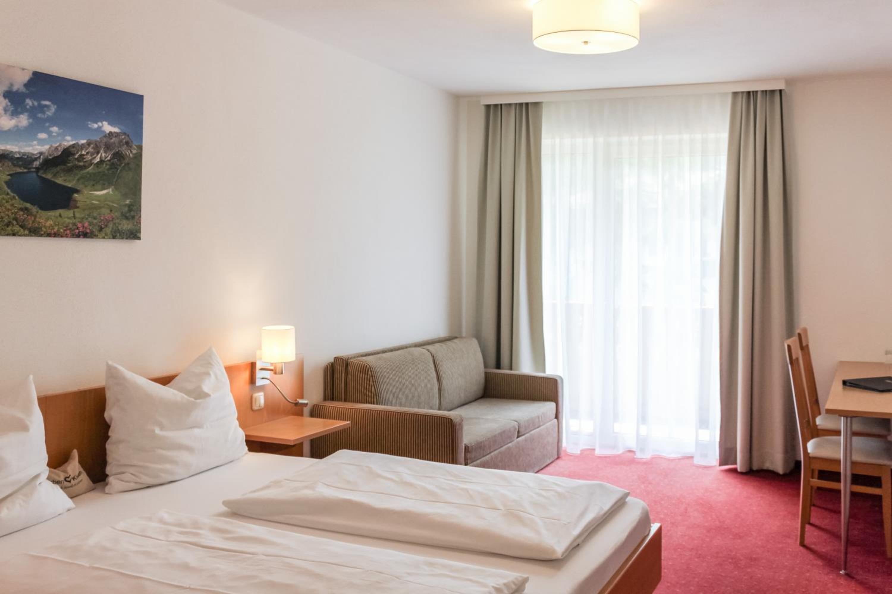 Quadruple Room with Balcony photo 3