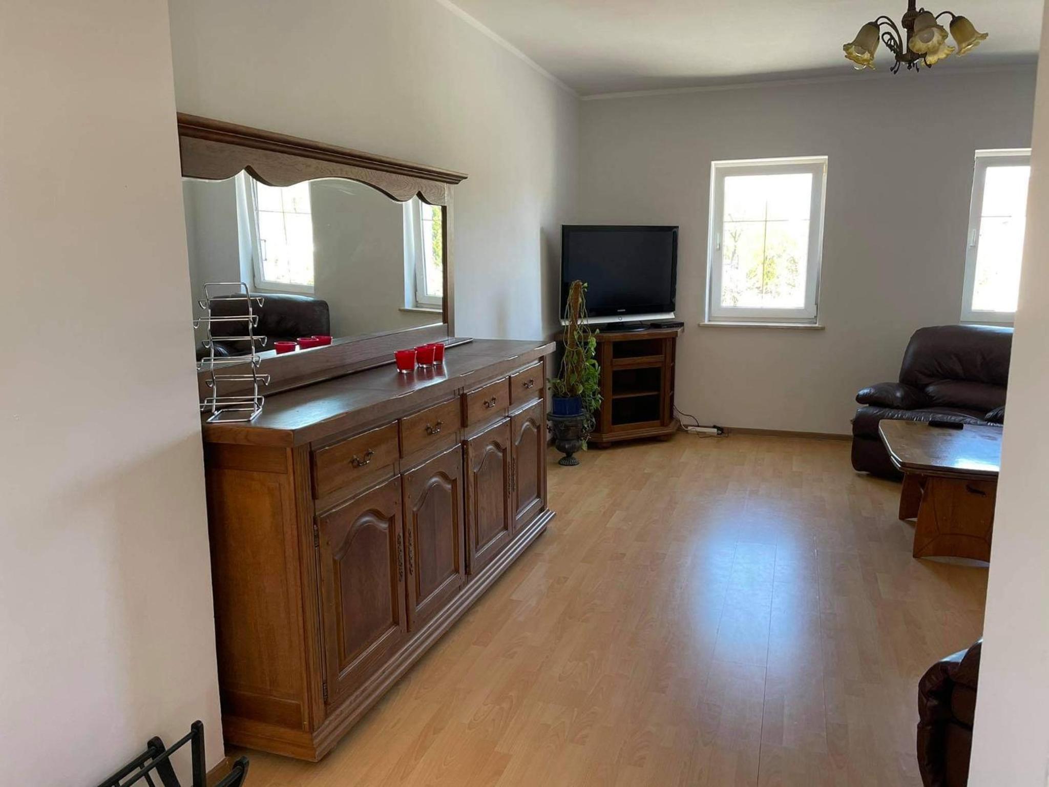 Three-Bedroom Apartment - Photo 2