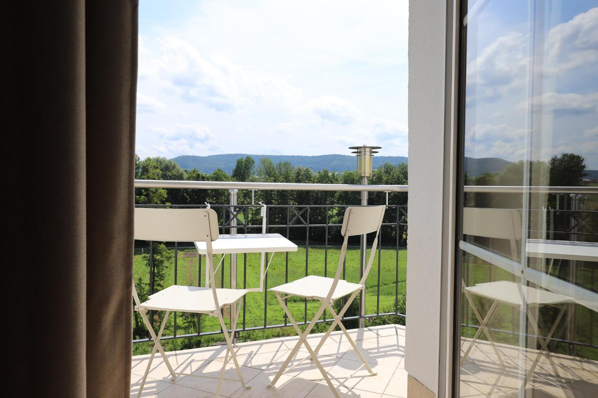 Apartment with Balcony - Photo 8