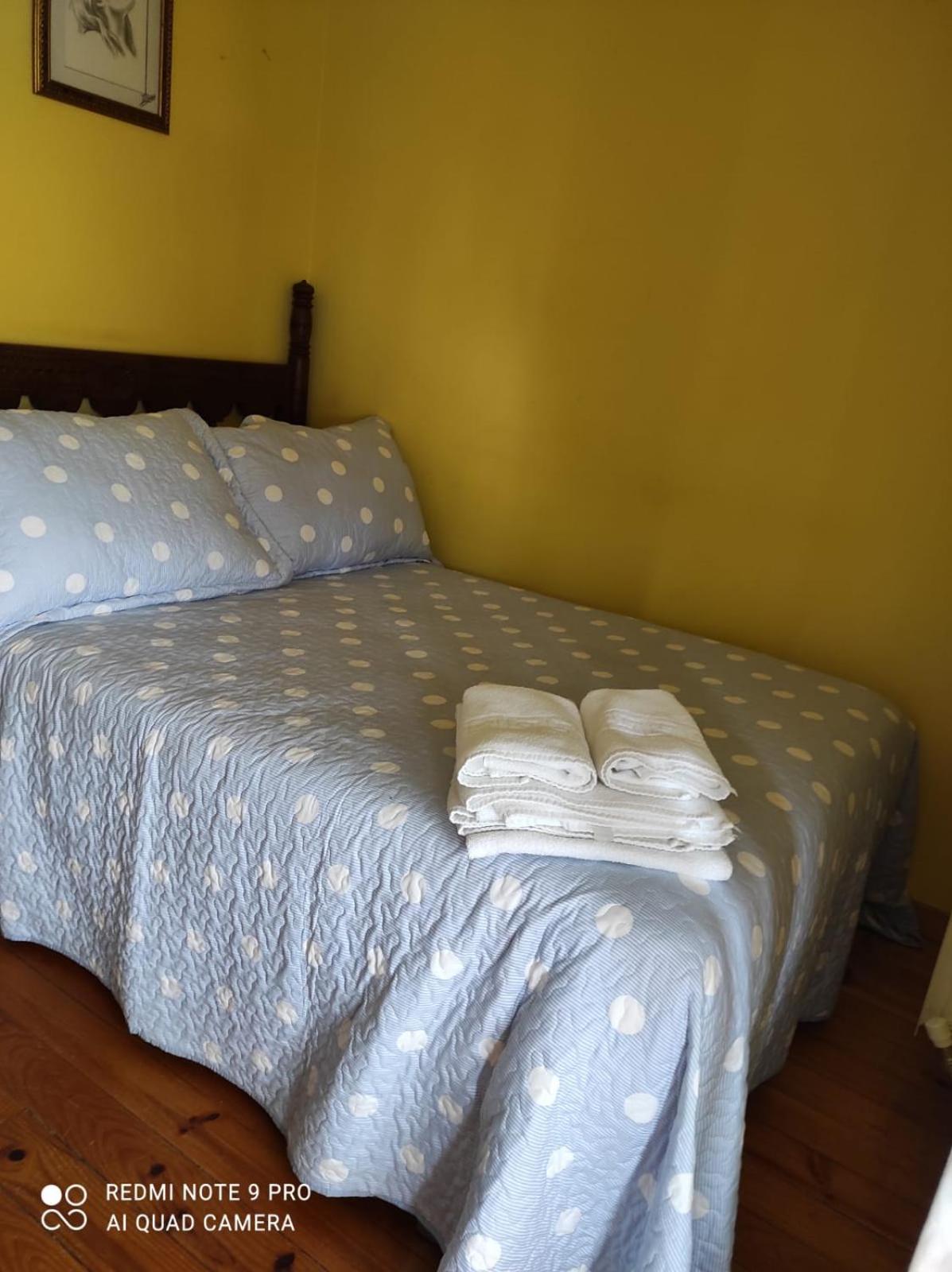 Habitación Queen con Baño Compartido