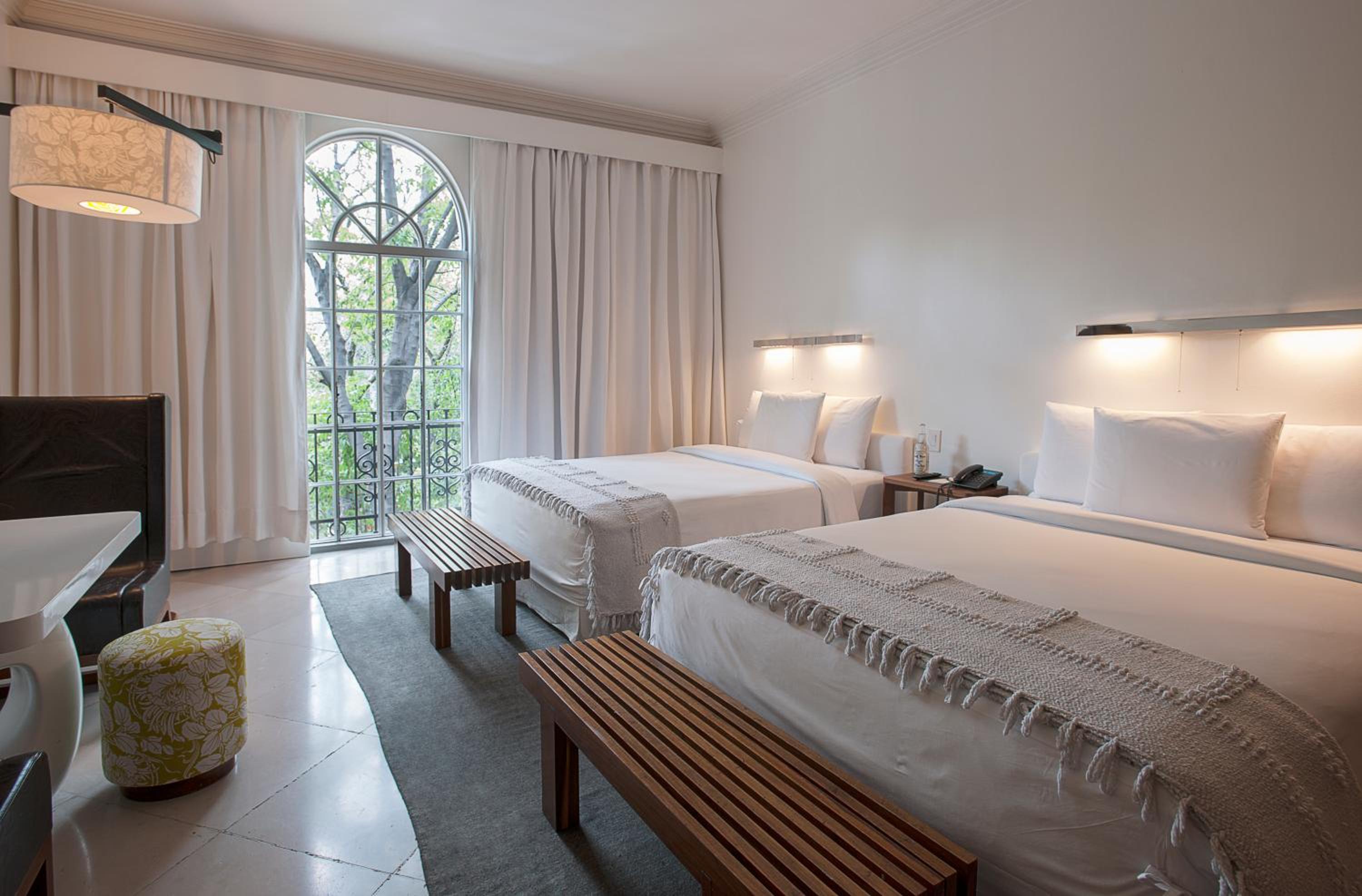 Queen Room with Two Queen Beds and Balcony - Photo 1