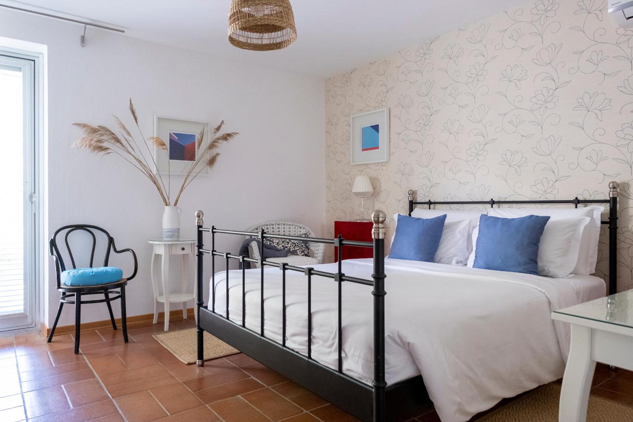 Deluxe Double Room with Balcony - Photo 1